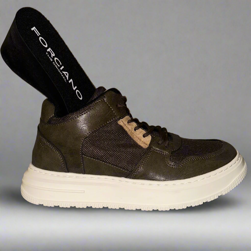 Brown sneaker with white sole on a reflective surface, brand name visible.