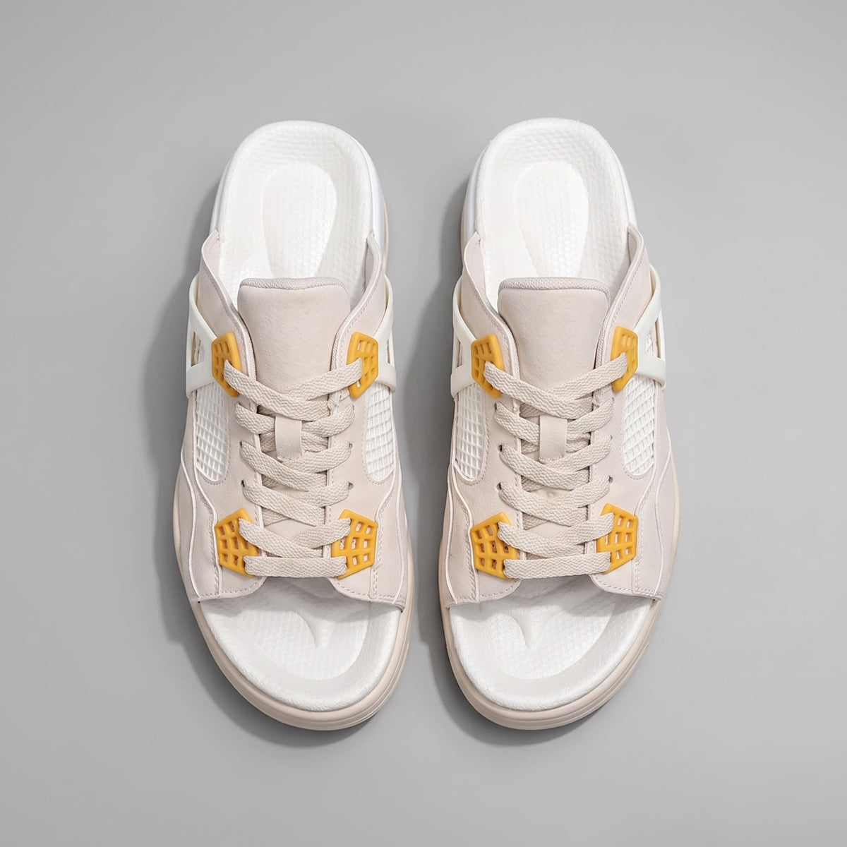 Pair of beige FORCIANO AERO Height Increasing Slippers shown from the top with beige laces and yellow accents.