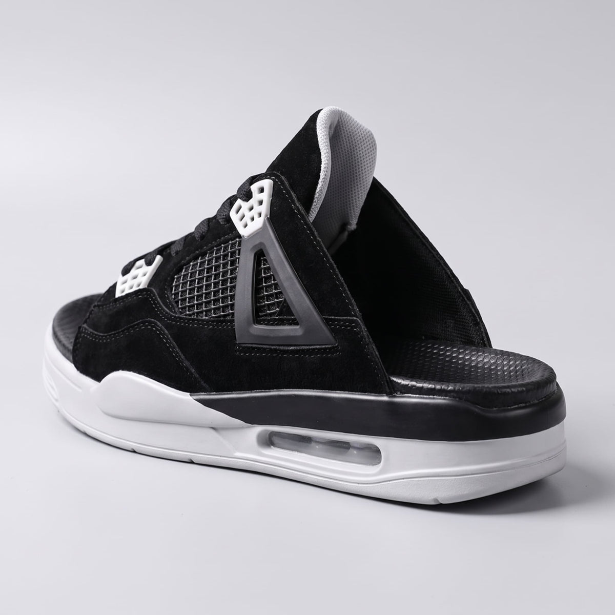 Black FORCIANO AERO Height Increasing Slippers shown from a rear three-quarter angle with the raised sole visible.