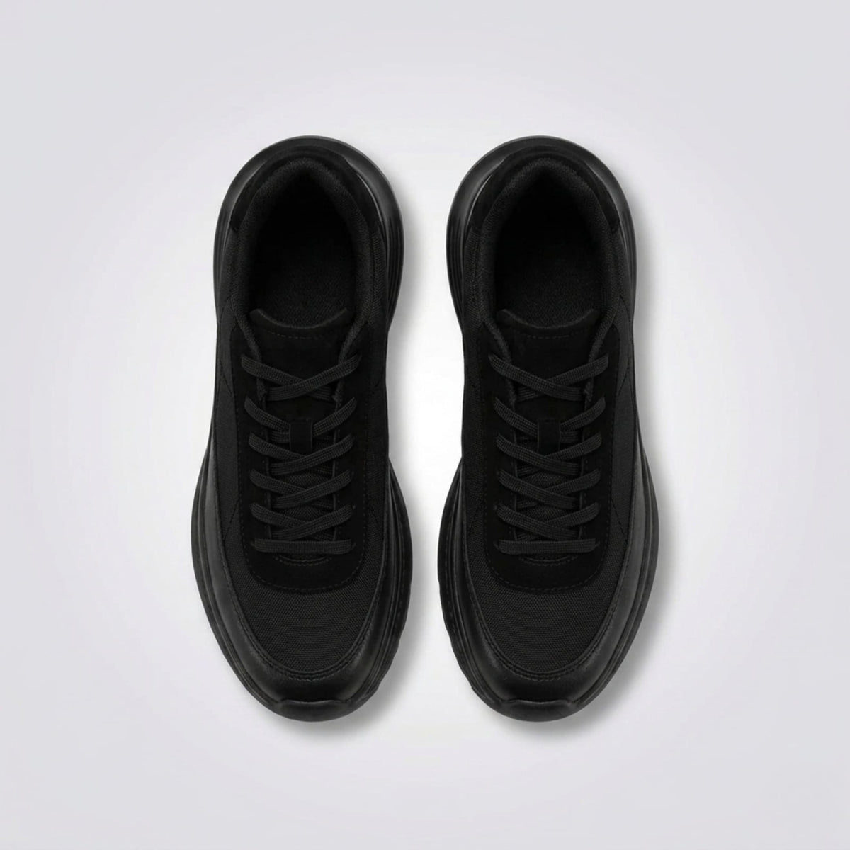 FORCIANO AEROX black height increasing sneakers with premium leather upper displayed as a pair from a top view with black laces visible.