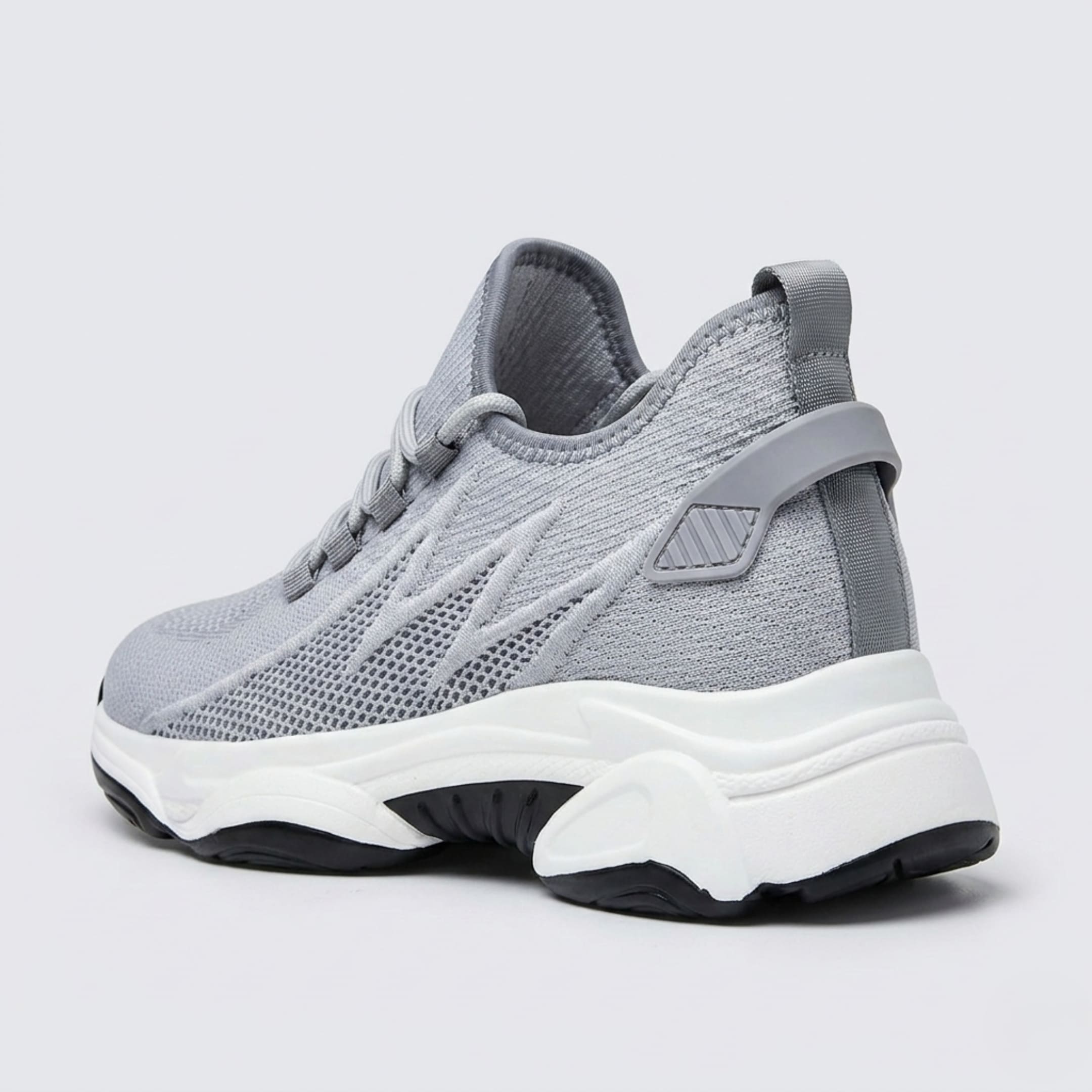 FORCIANO ALTITUDE gray breathable mesh height increasing sneaker shown from the rear side angle