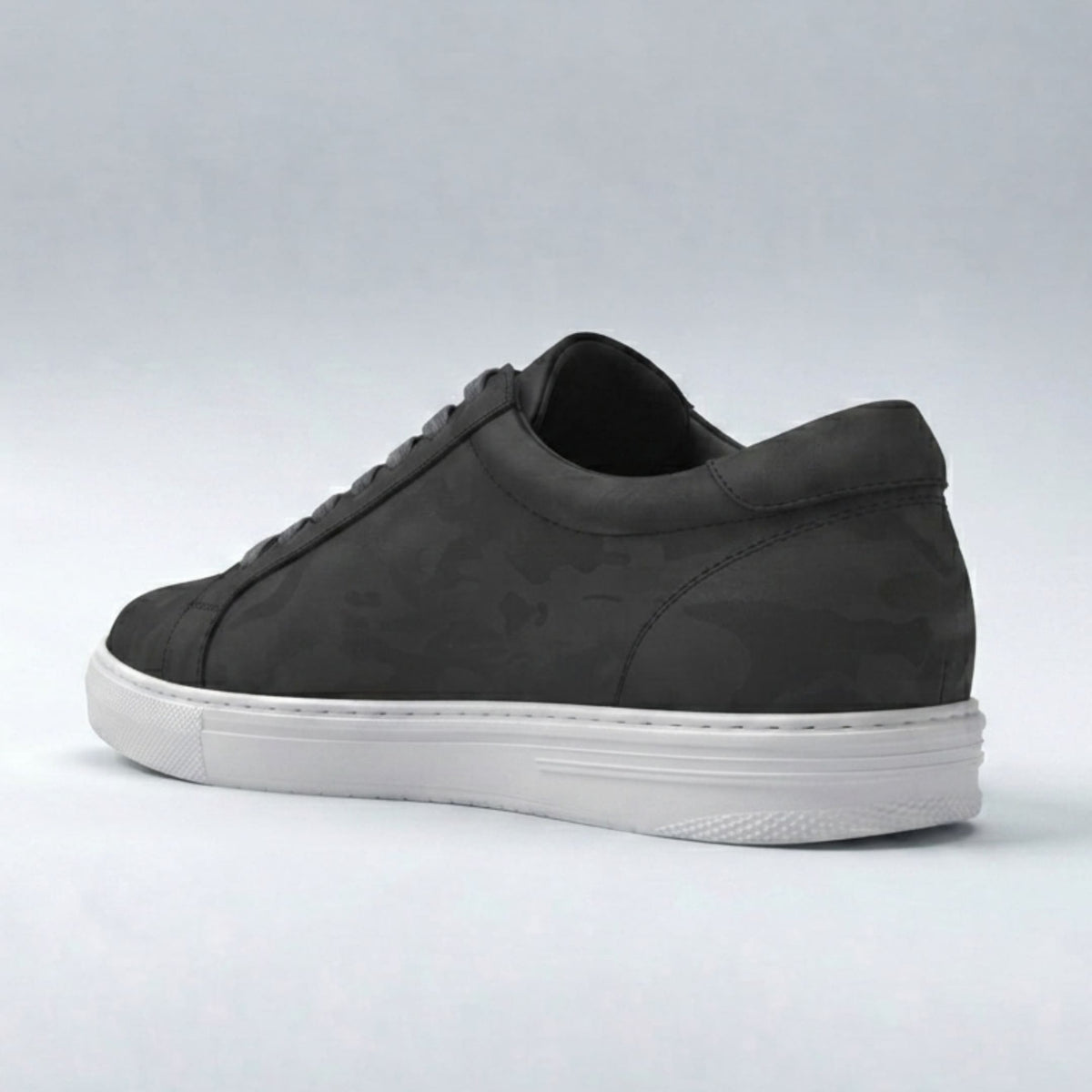 FORCIANO ATHENA black women's elevator sneaker in a rear three-quarter view with premium leather upper, tonal heel detailing and contrasting white sole.