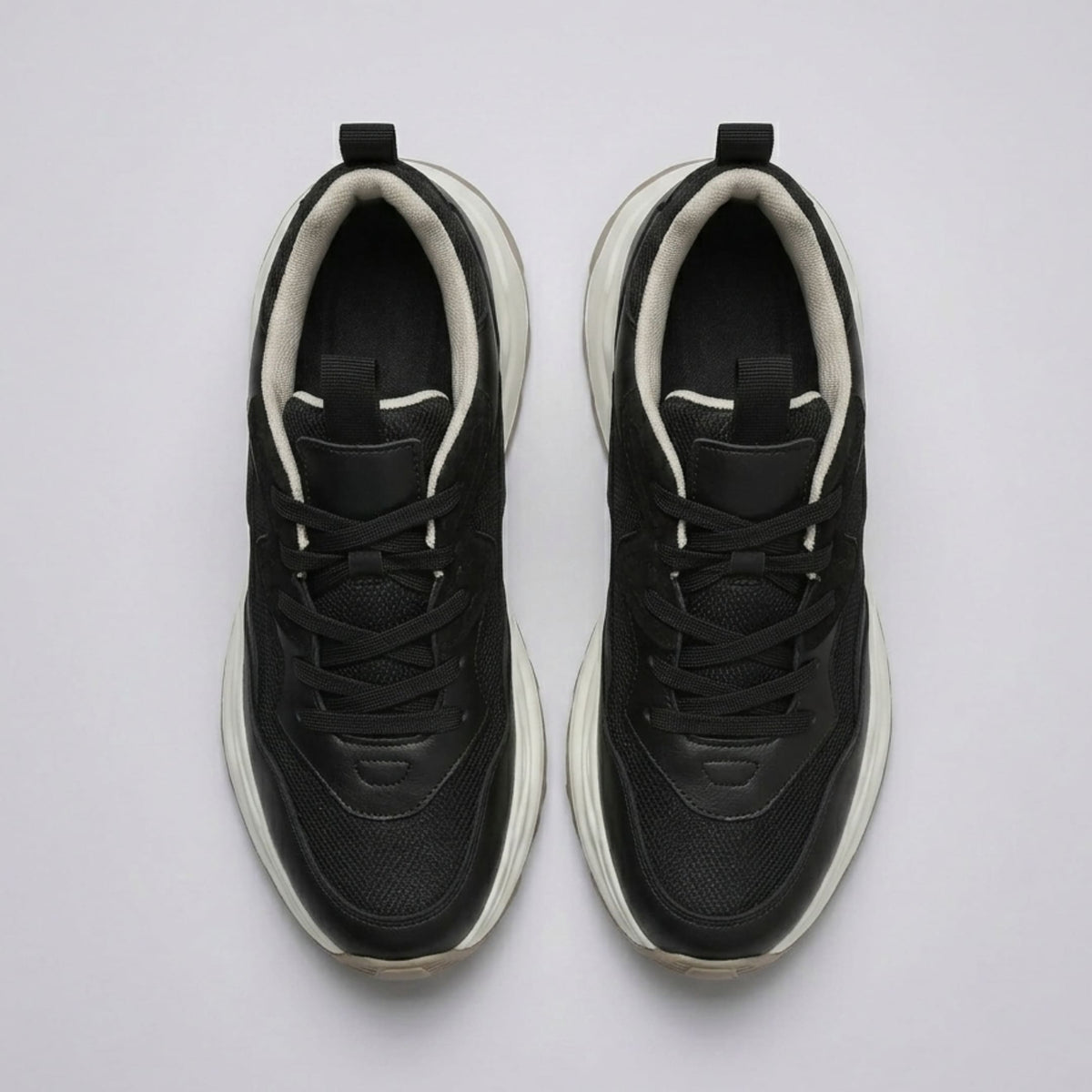Top view of FORCIANO BELLE black sneakers for women, showing the pair, lace-up design, premium leather upper and contrasting inner trim.