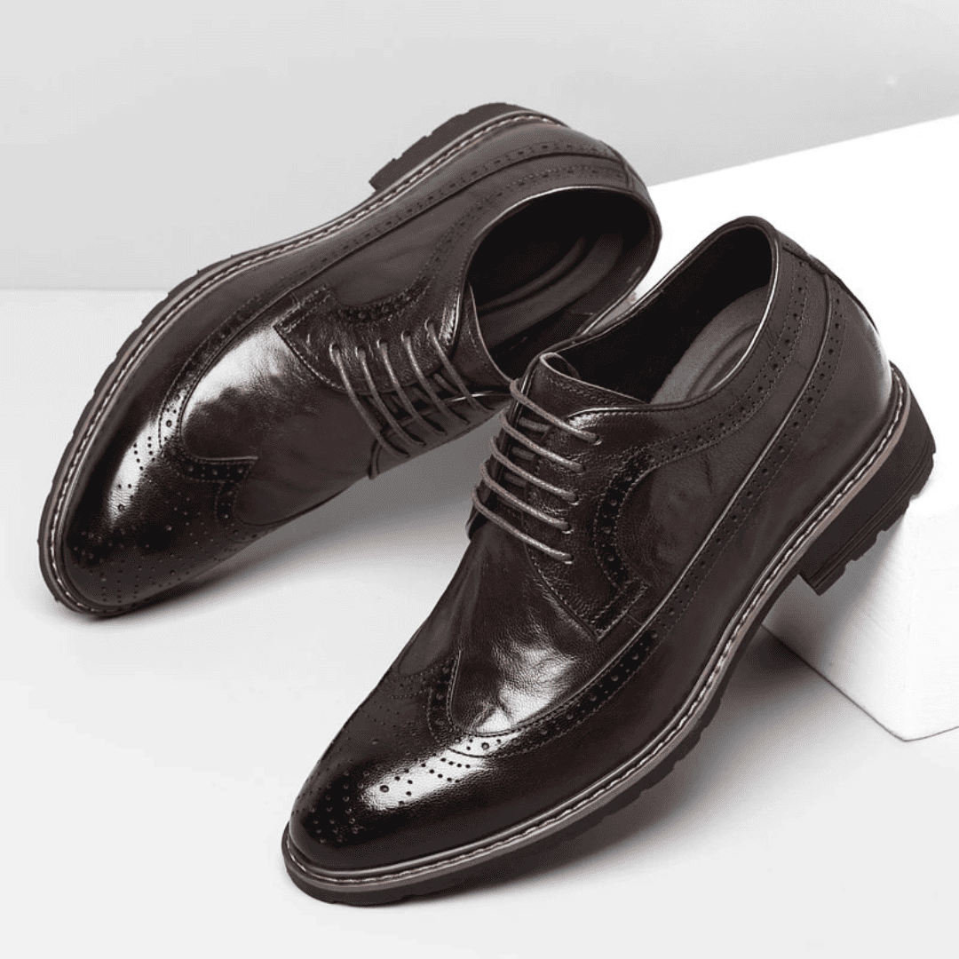 FORCIANO CELSUS brown elevator dress shoes with premium leather uppers displayed as an angled pair, highlighting the lace-up and brogue details.