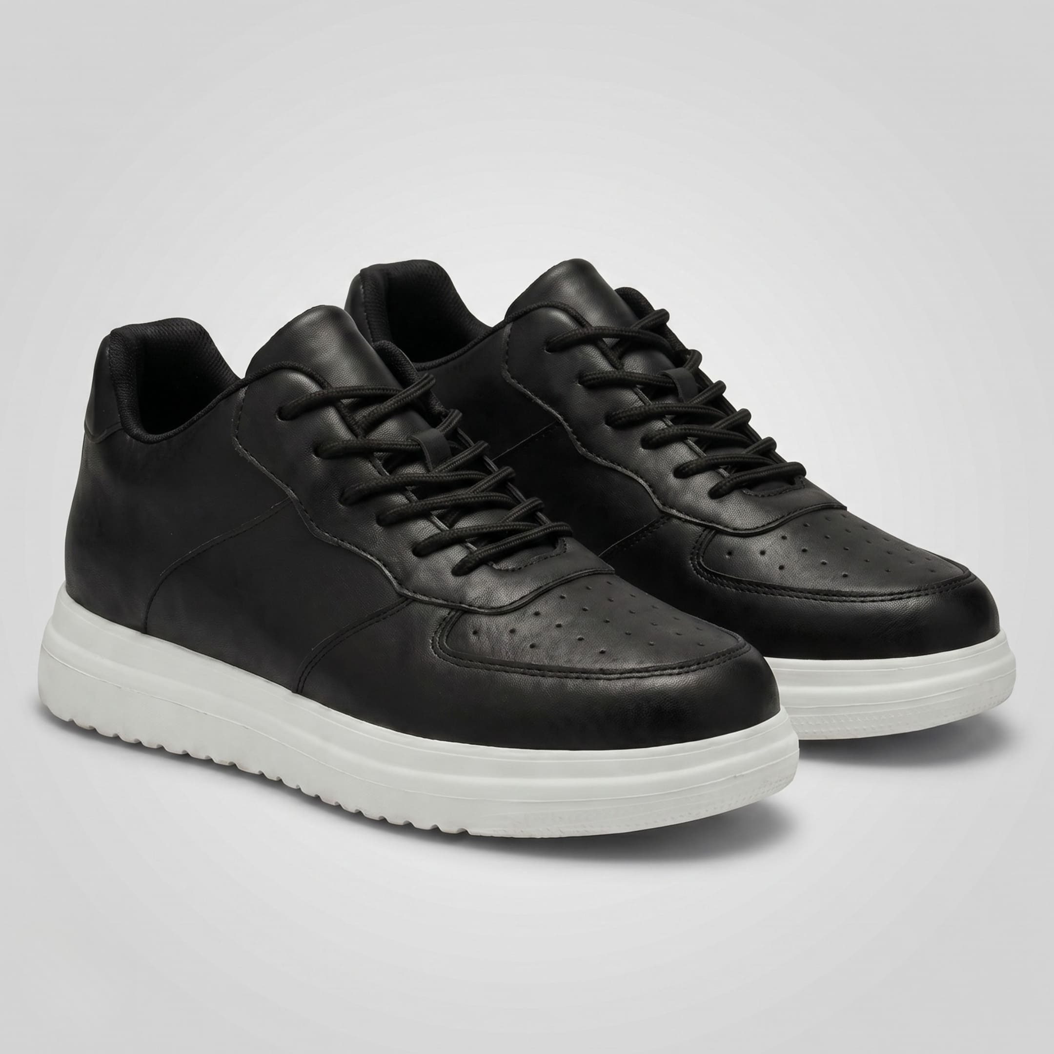 FORCIANO CHAMPION black height increasing sneakers shown as a pair from a front angle with black lace-up uppers and white raised soles.