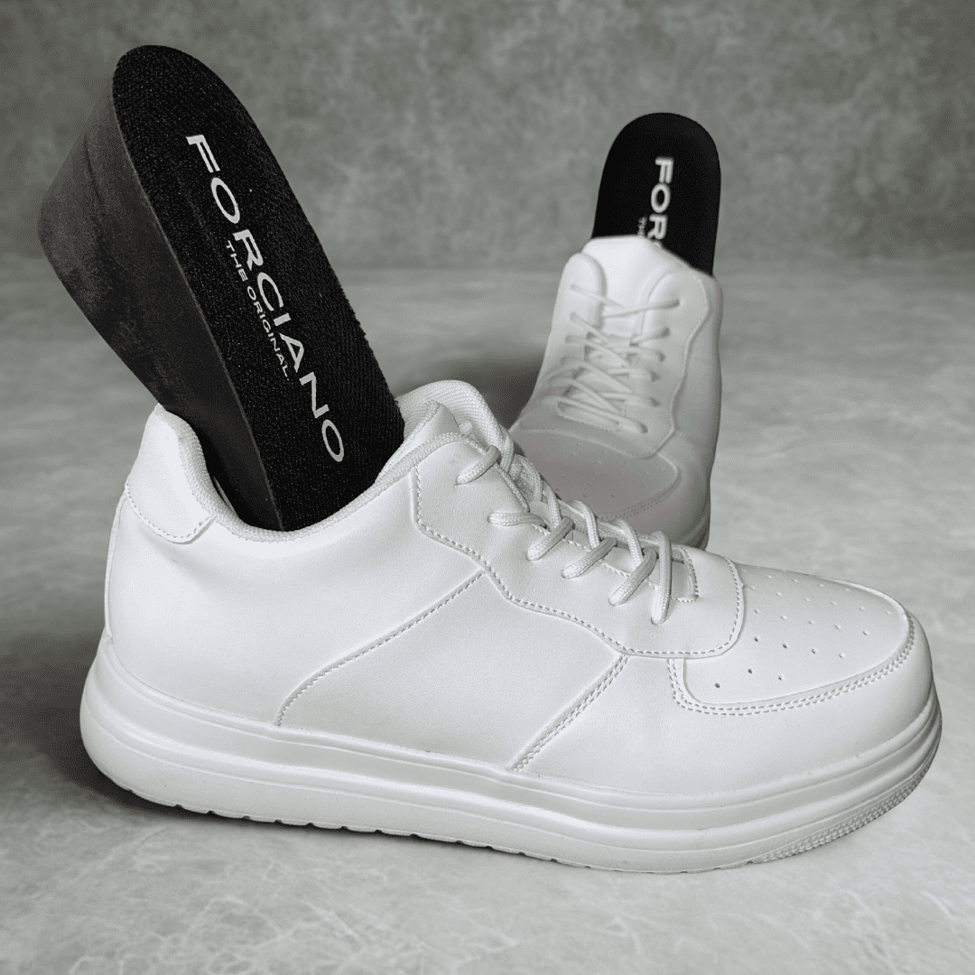 FORCIANO CHAMPION white Elevator Sneakers shown as a pair with black FORCIANO lift inserts visibly positioned inside the shoes.