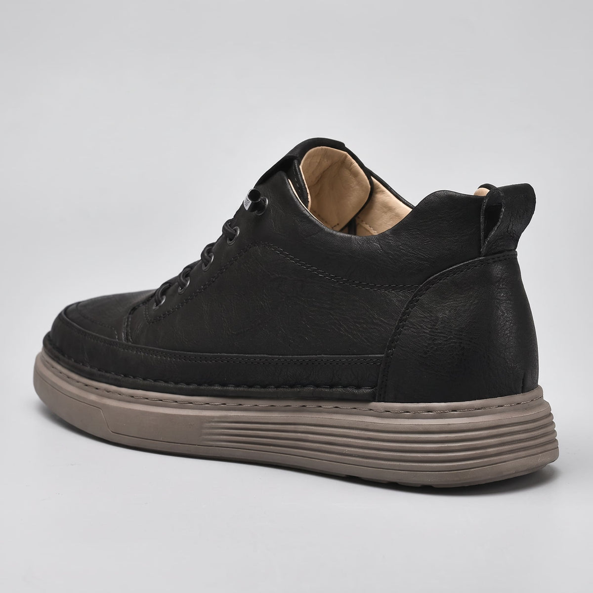 FORCIANO COURAGE Black Height-Increasing Shoes shown from the rear side angle with premium leather upper, tonal stitching and heel pull tab.