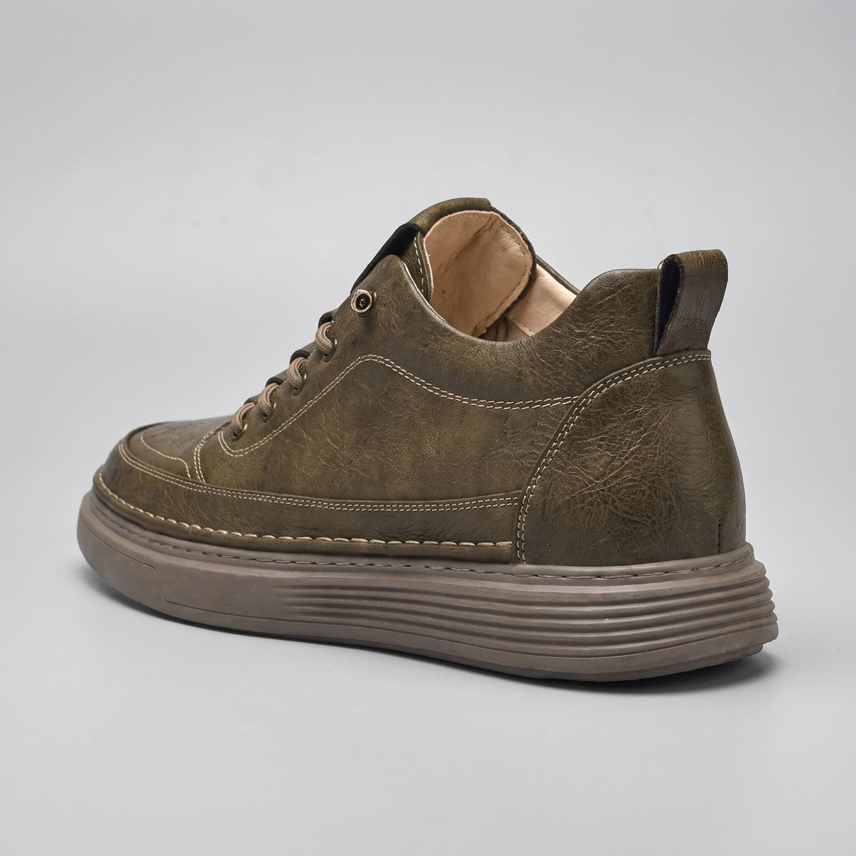 FORCIANO COURAGE Brown Height-Increasing Shoes in a rear three-quarter view highlighting the premium leather upper, stitched heel panel and pull tab.
