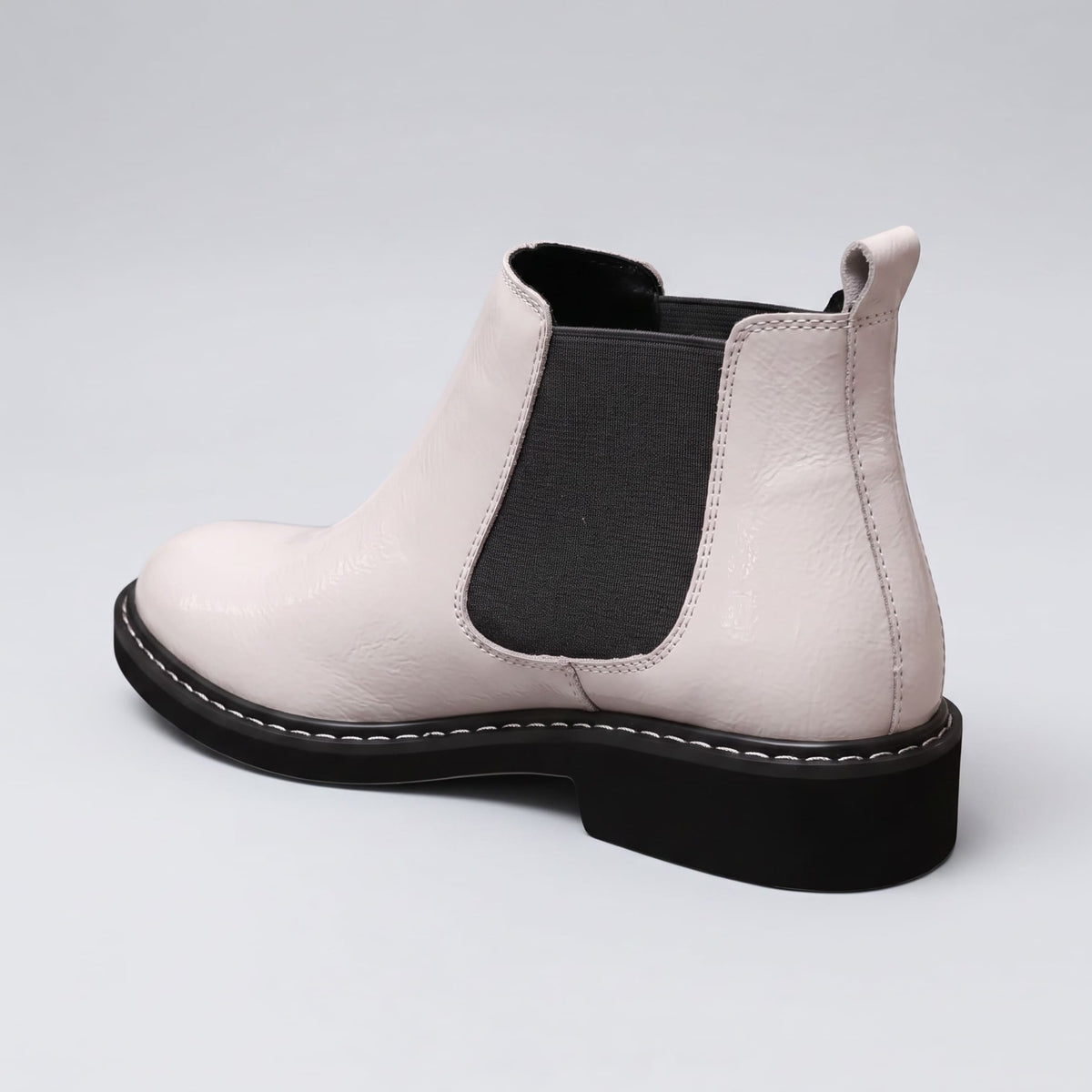 FORCIANO CROXTON Elevator Boots in white premium leather shown from a rear side angle with black elastic panel