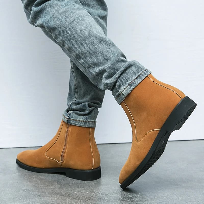 FORCIANO ECLIPSE brown suede Chelsea boots shown on foot with gray jeans, highlighting the rear and side profiles.