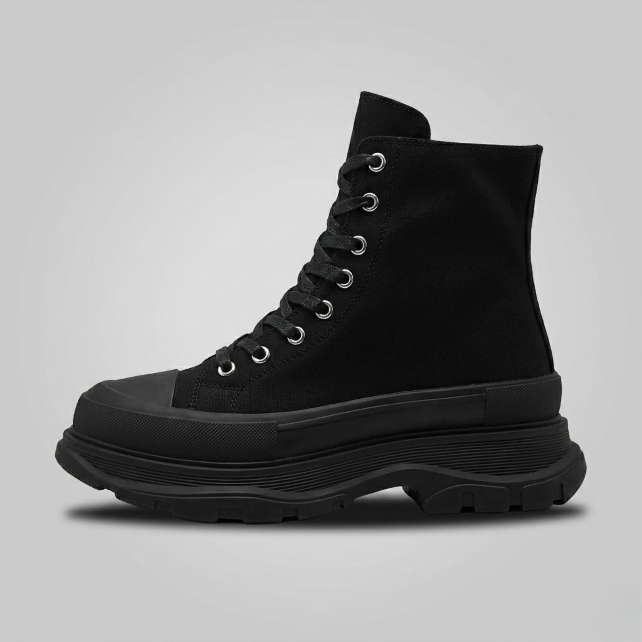 FORCIANO ELEVATOR black height increasing sneaker with black laces and thick cushioned sole shown in a clean side profile.