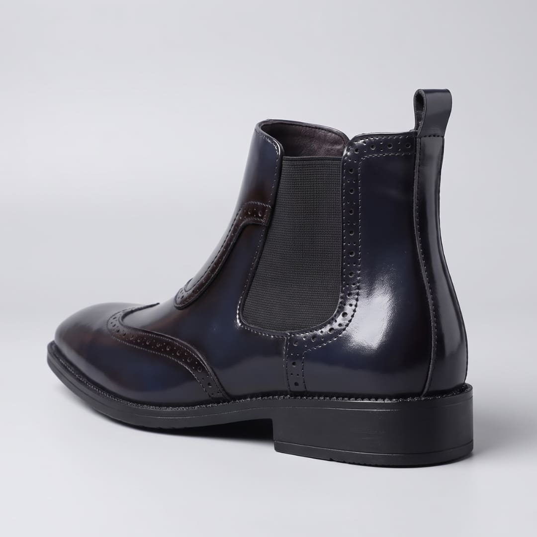 FORCIANO FORTRESS blue Elevator Boots shown from the rear three-quarter view with elastic side panel and heel pull tab.