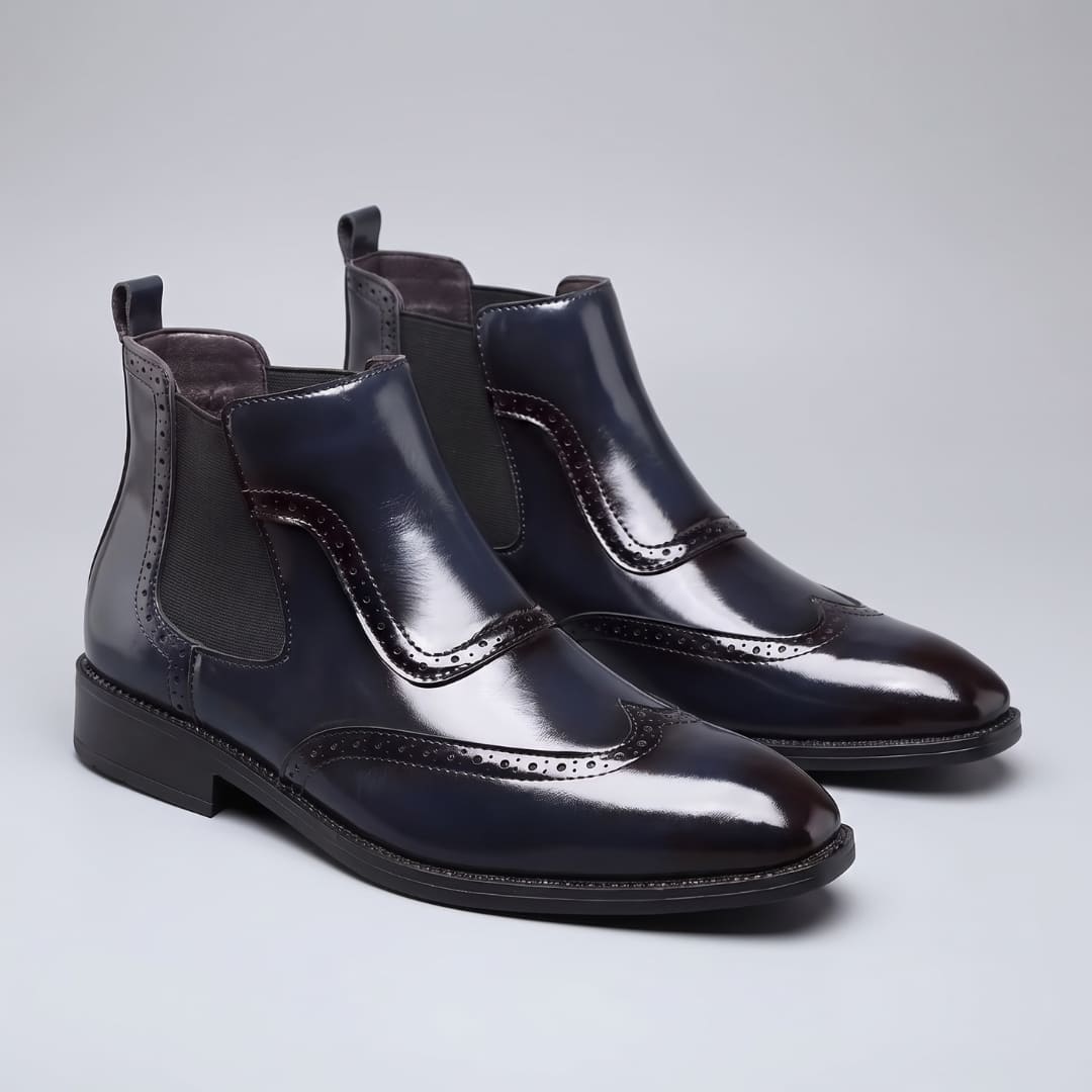 Pair of blue FORCIANO FORTRESS Elevator Boots showing leather uppers and elastic side panels