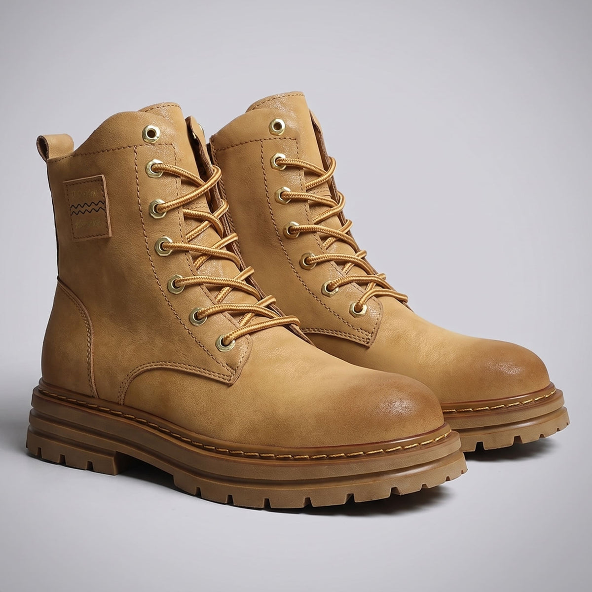 FORCIANO FRONTLINE Boots That Make You Taller in brown premium leather shown as a pair from a front three-quarter angle.