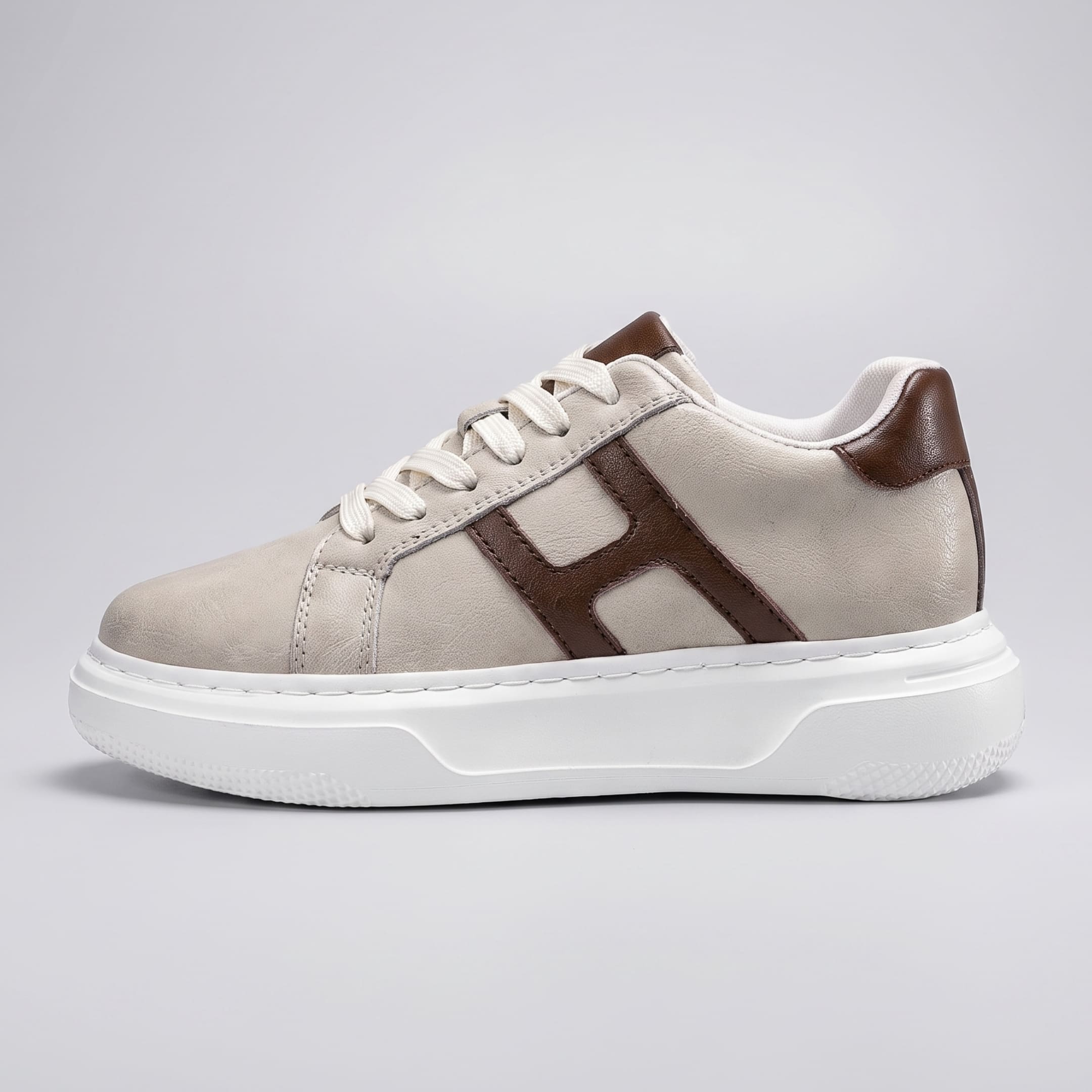 Full side profile of FORCIANO HERCULES beige premium leather Height Increasing Sneaker with brown side accent, white laces, and white sole.
