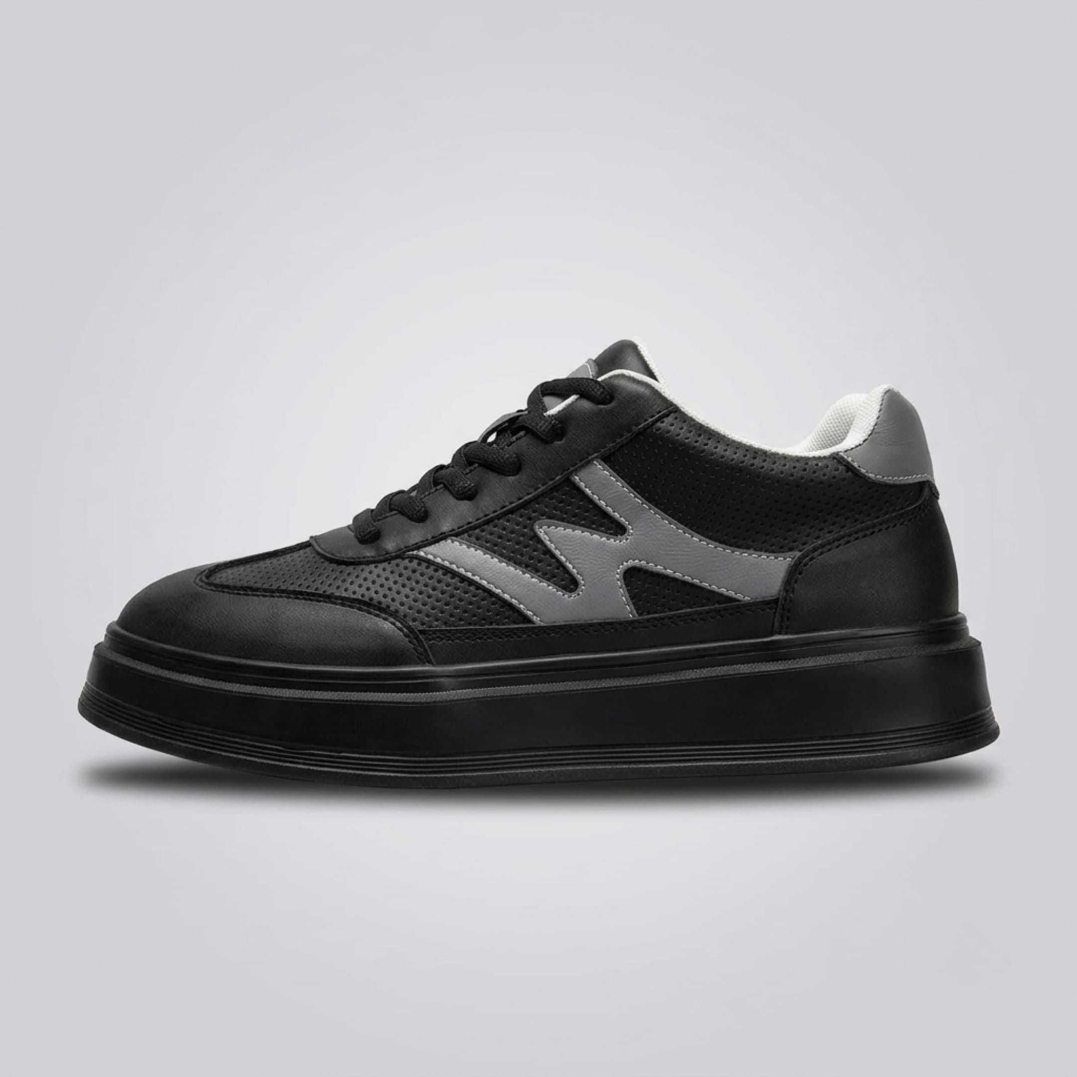 FORCIANO MILANO black height increasing shoes in sneaker side profile with leather upper, gray side accents and black platform sole.