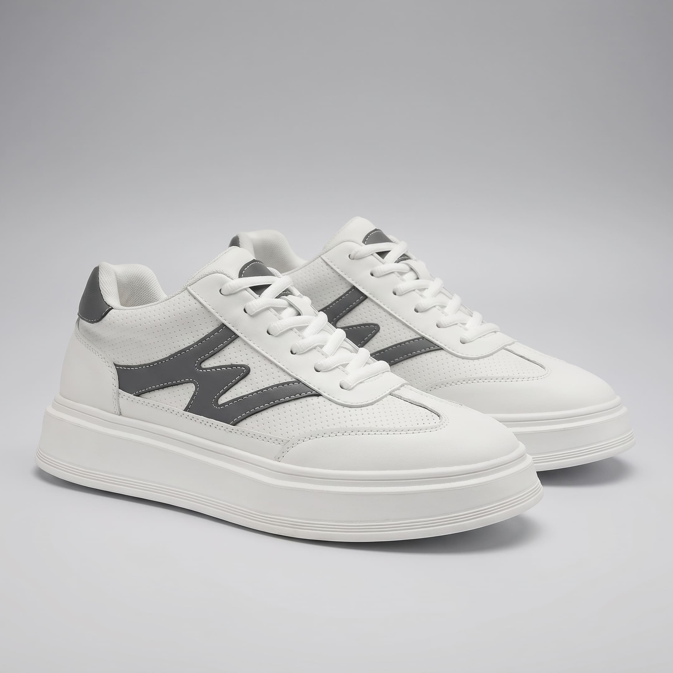 FORCIANO MILANO white height increasing shoes shown as a pair from the front angle, with leather upper, gray side accents and white platform soles.