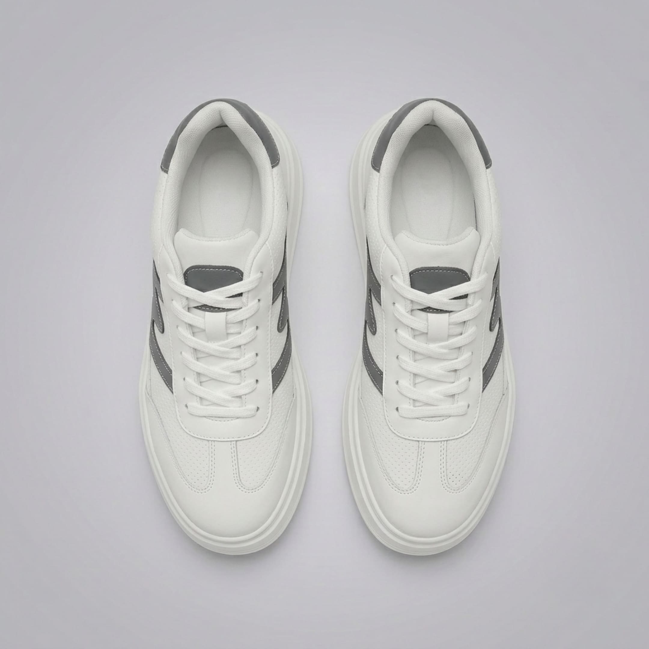 FORCIANO MILANO white height increasing sneakers shown as a pair from the top view with white laces, leather upper and gray accents.