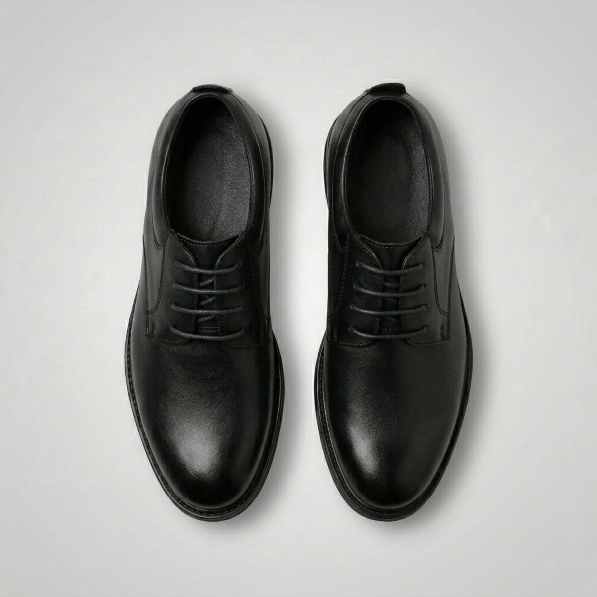 FORCIANO MOMENTUM black Elevator Dress Shoes shown as a pair from above with the lace-up design clearly visible.
