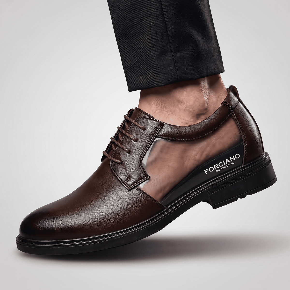 FORCIANO MOMENTUM brown Elevator Dress Shoes shown in side-profile cutaway view with the internal lift and FORCIANO branding visible.