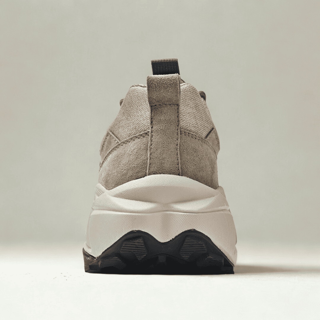 FORCIANO NORTHRIDGE beige height increasing sneakers shown from the rear, highlighting the heel pull tab, raised sole and black outsole sections.