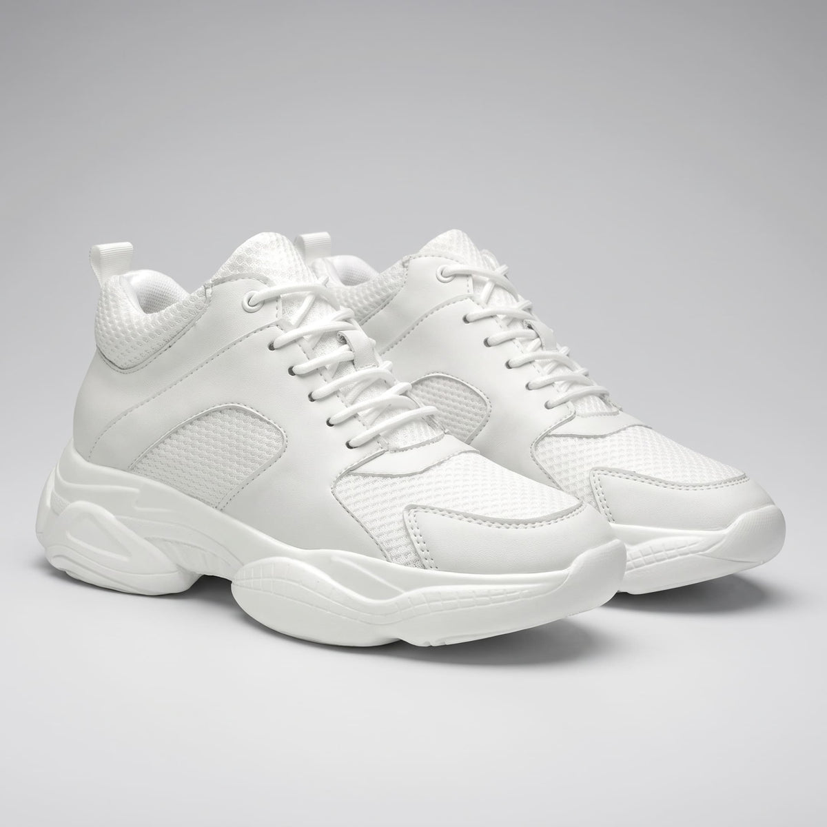 FORCIANO PEGASUS white height increasing sneakers shown as a pair from a front three-quarter angle.
