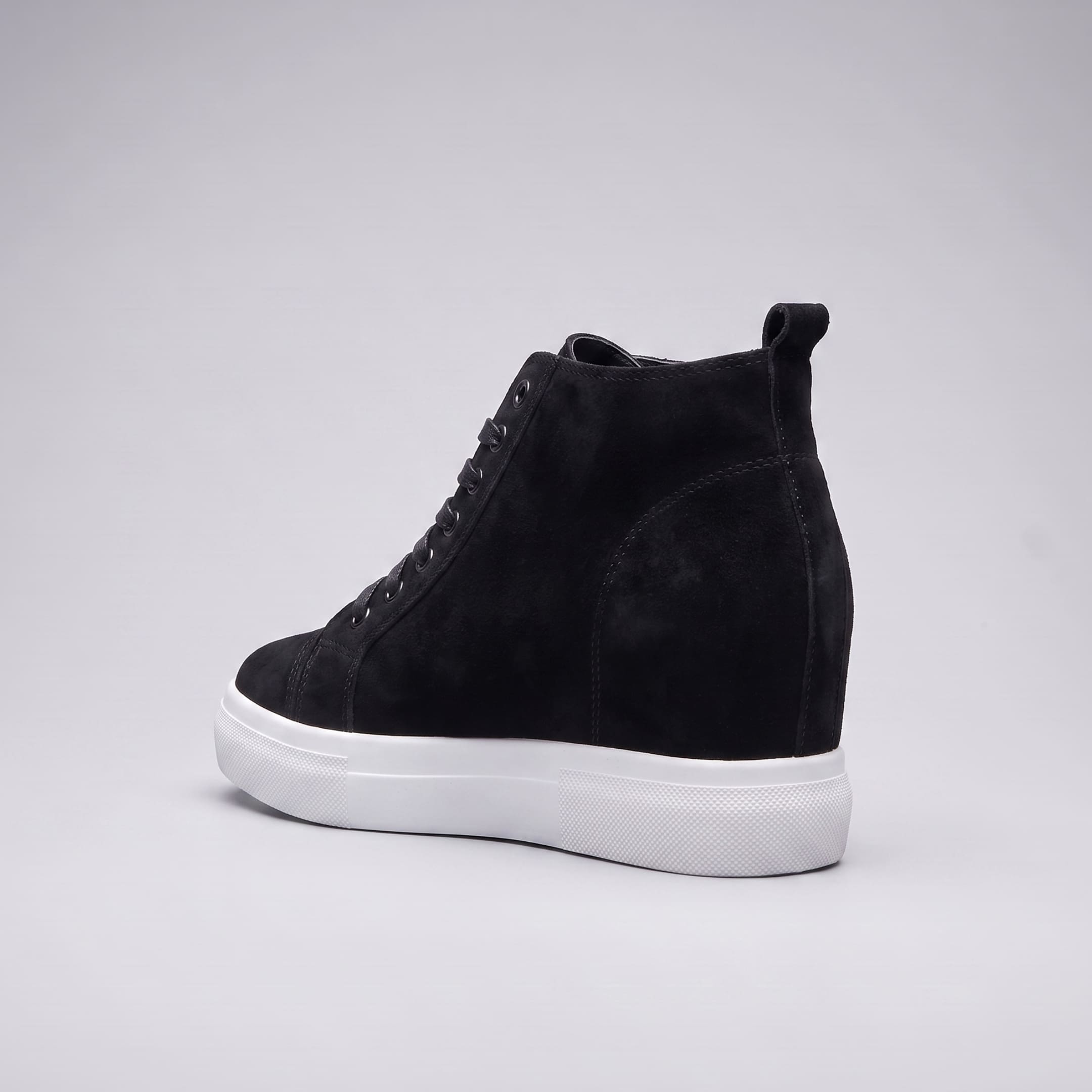 FORCIANO PRESLEY Black sneakers for Women shown from the rear side with premium suede leather upper, stitched heel panel, pull tab and contrasting white sole.