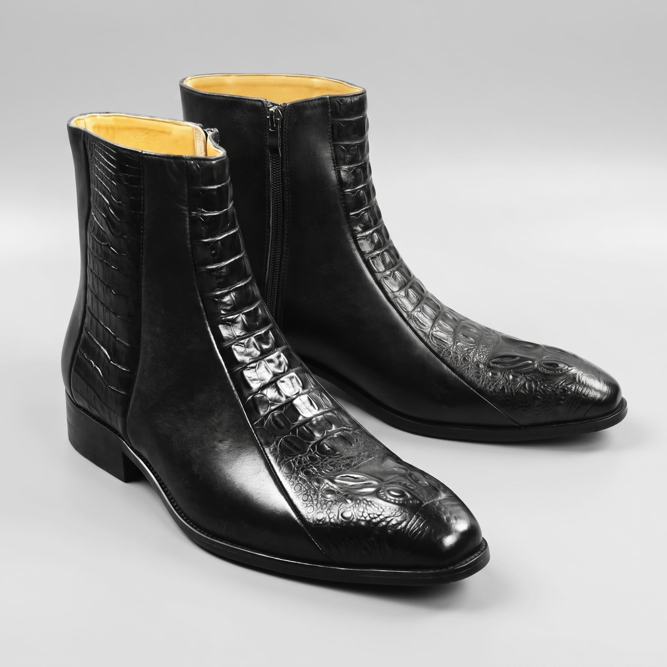 FORCIANO SAVIERO black elevator boots with genuine leather uppers and crocodile-engraved detailing, shown as a pair from a front three-quarter view.