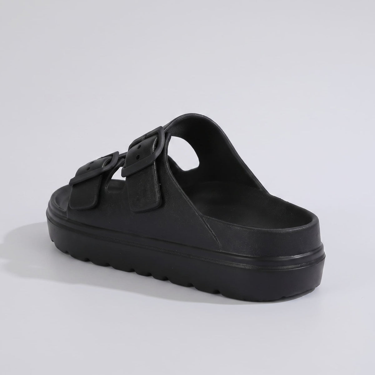 FORCIANO SERENA black platform sandals for women shown from a rear three-quarter angle with double buckle straps and premium EVA construction.