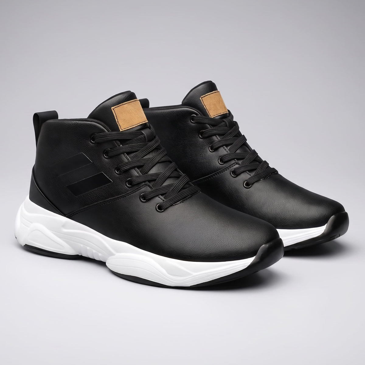 FORCIANO SONIC Height Boosting Sneakers in black with leather upper and white soles, shown as a pair from the front three-quarter angle.