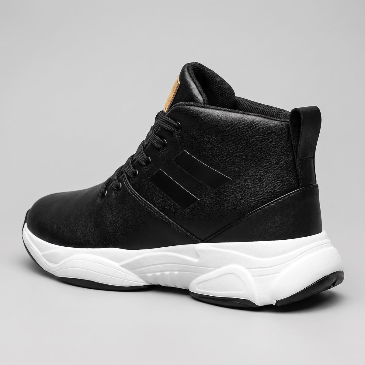 FORCIANO SONIC Height Boosting Sneakers in black with leather upper and white sole, shown from a rear three-quarter angle.