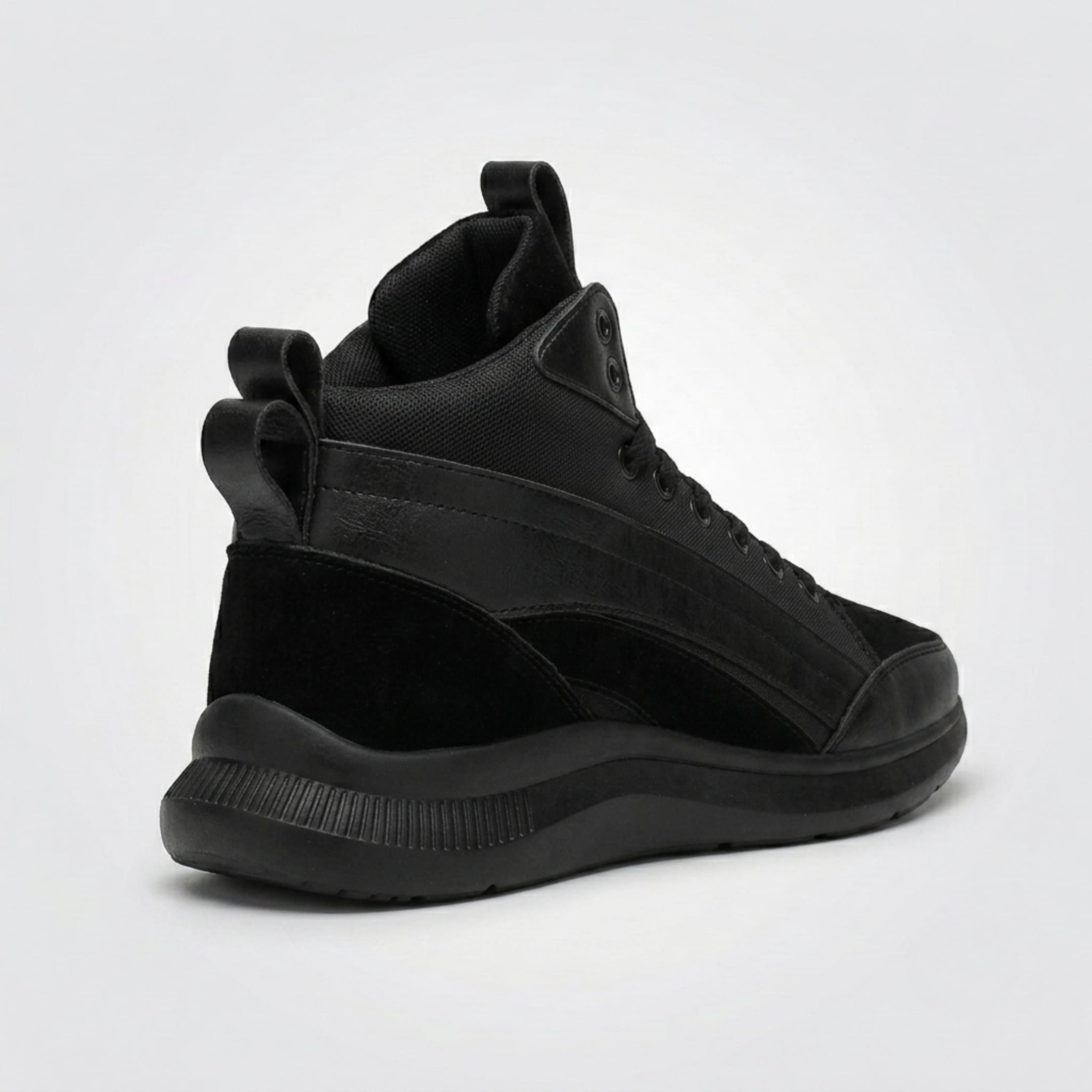 FORCIANO STRIDE black elevator sneakers shown from a rear three-quarter view with high-top construction visible.