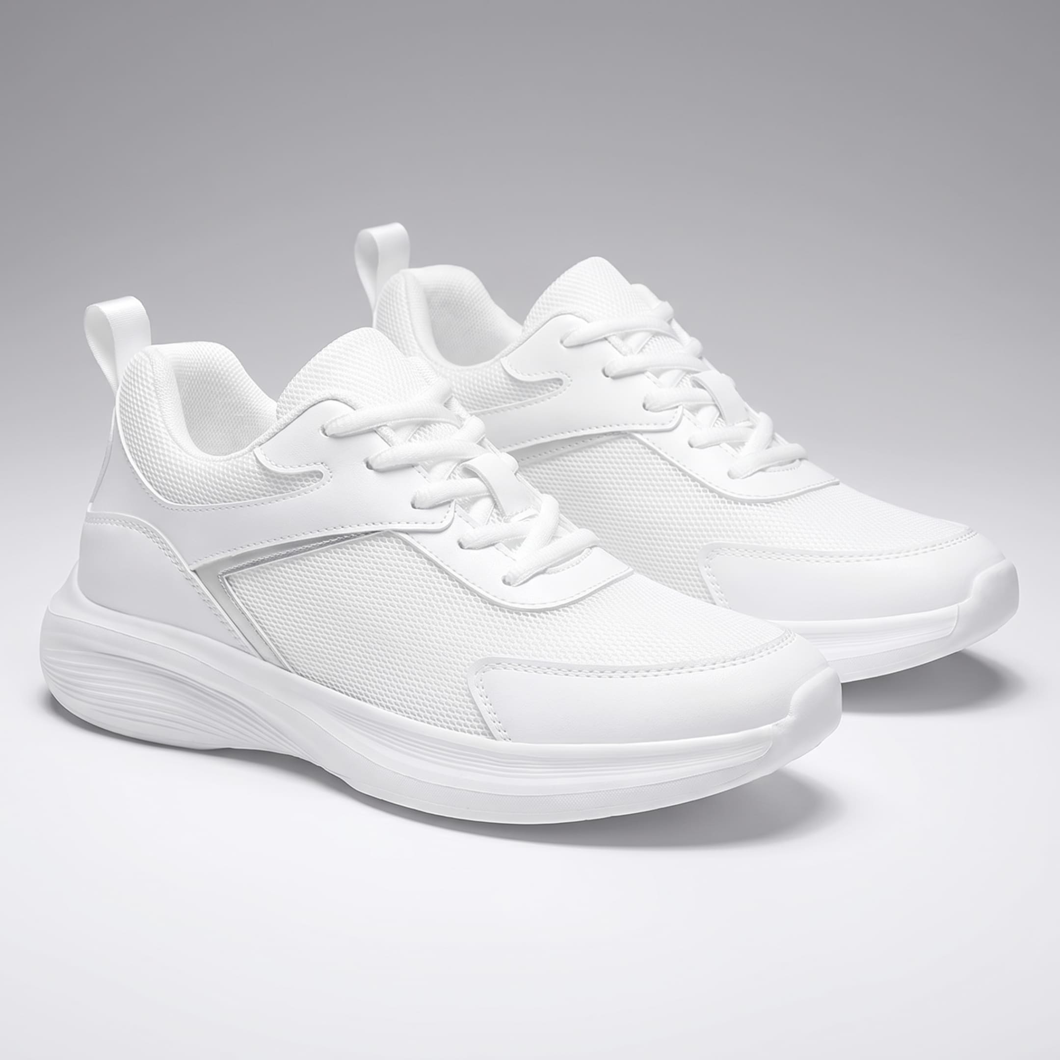 FORCIANO SUTTON white height increasing sneakers for women shown as a pair in front three-quarter view with Flyknit mesh uppers, laces and white soles.