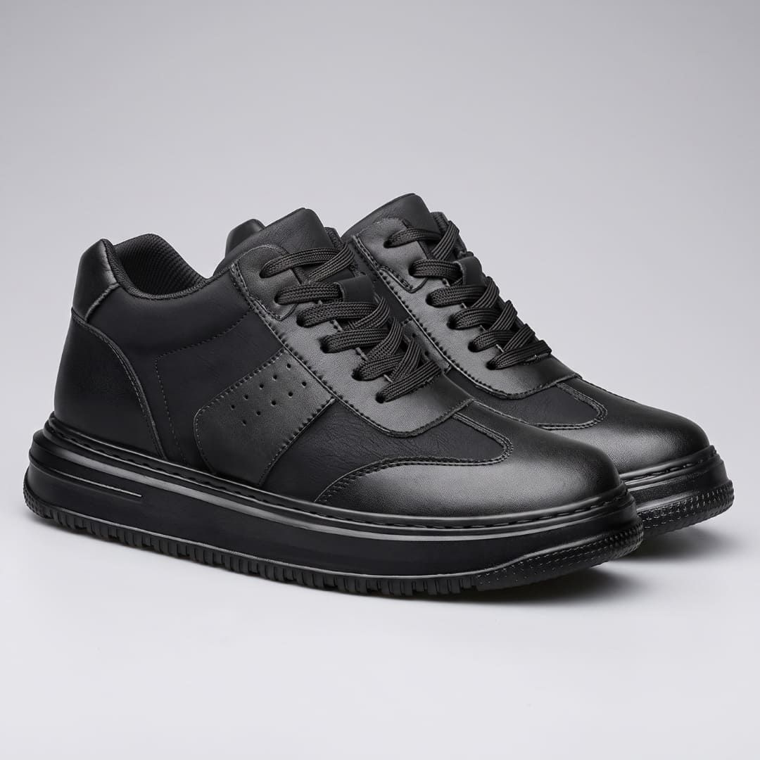 Pair of black FORCIANO TORINO Height Increasing Sneakers with leather uppers shown from a front three-quarter angle.