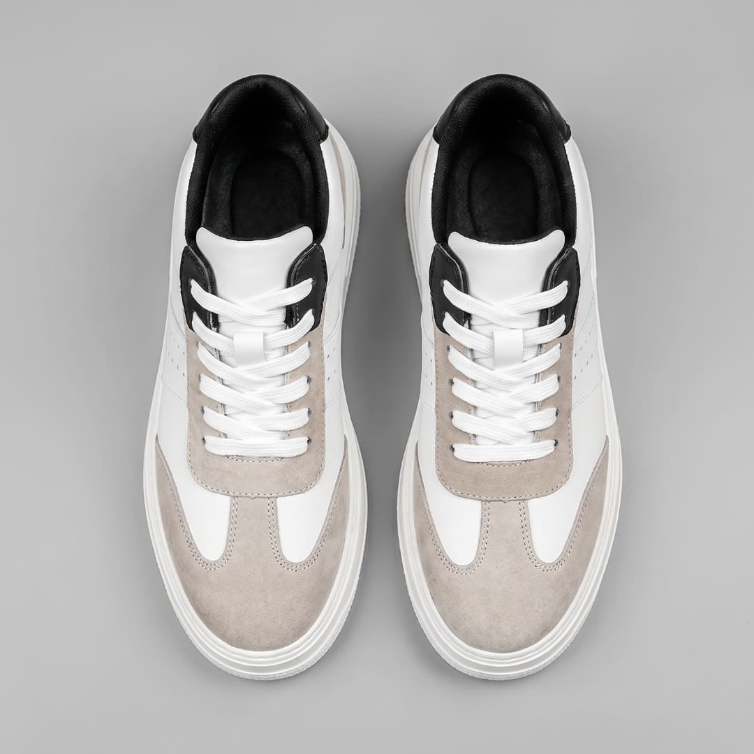 Pair of white FORCIANO TORINO Height Increasing Sneakers with leather uppers and laces shown from the top.