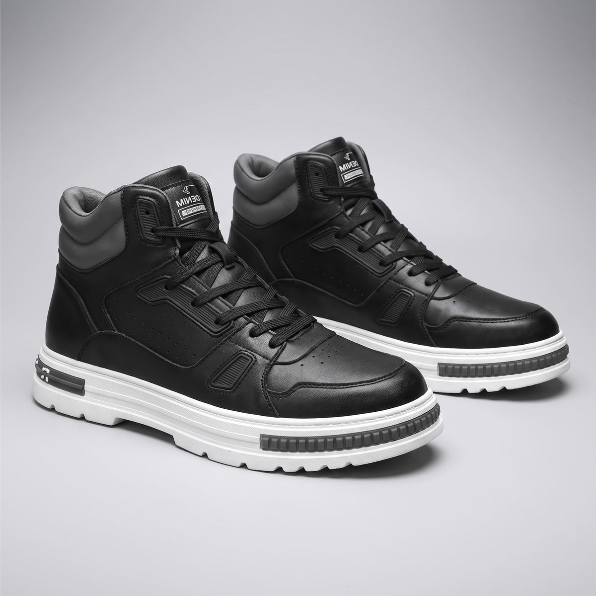 Pair of FORCIANO VADER Height Increasing Sneakers in black with white soles, shown from a front three-quarter angle.