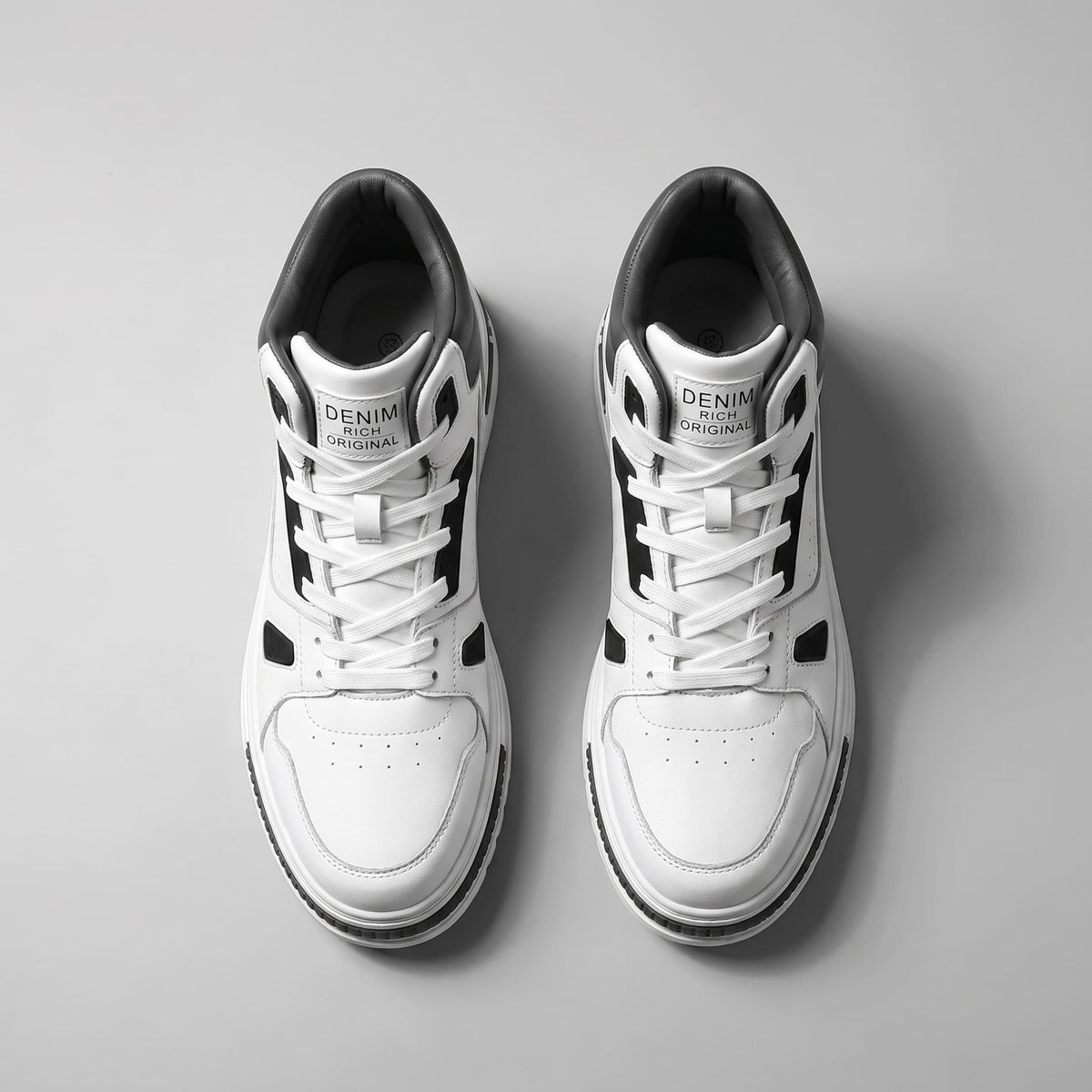 Pair of FORCIANO VADER Height Increasing Sneakers in white and black, shown from the top with laces and padded collars visible.