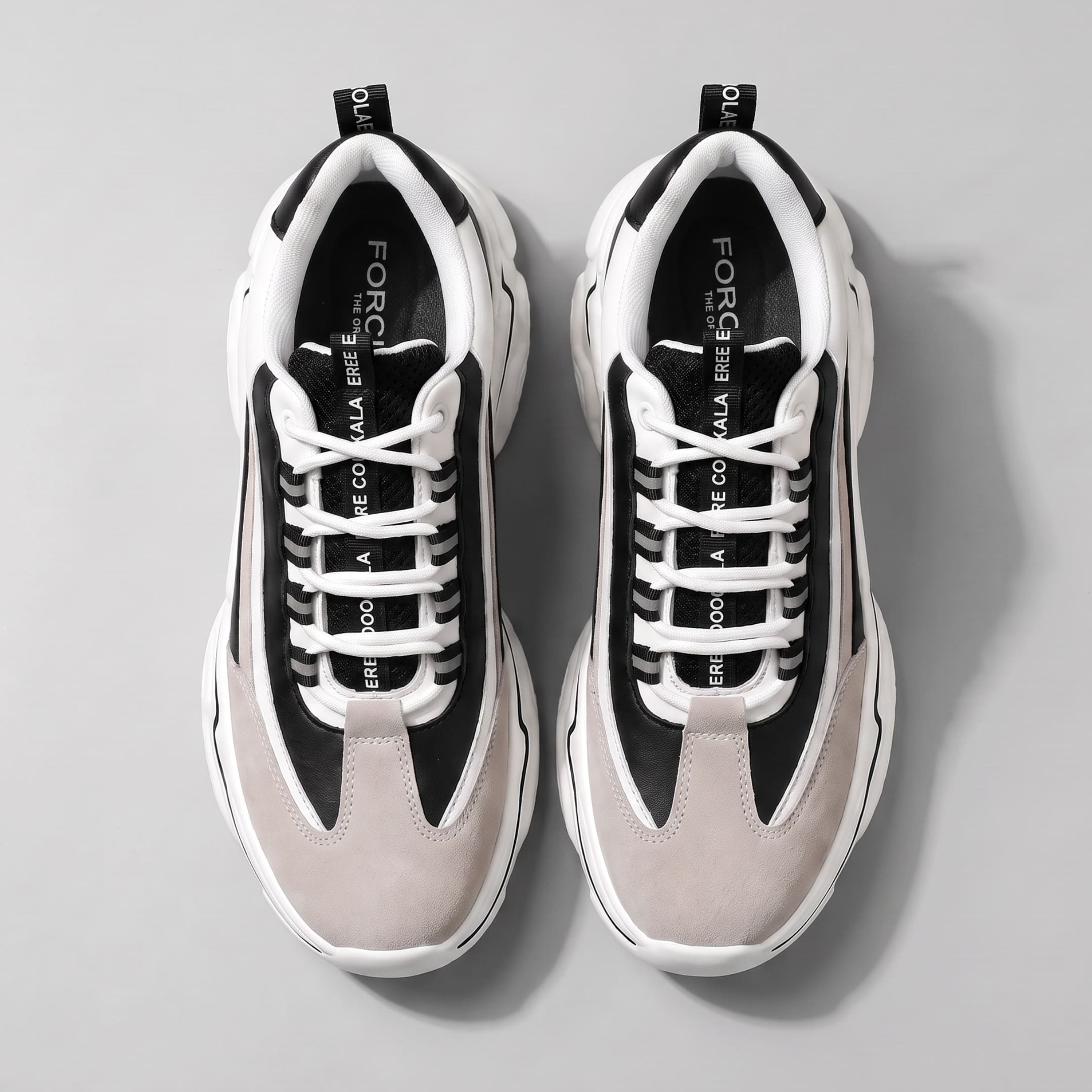 FORCIANO VALENCIA Height Increasing Sneakers for Women in black and white, shown in a top-view pair with breathable mesh tongues and lacing.