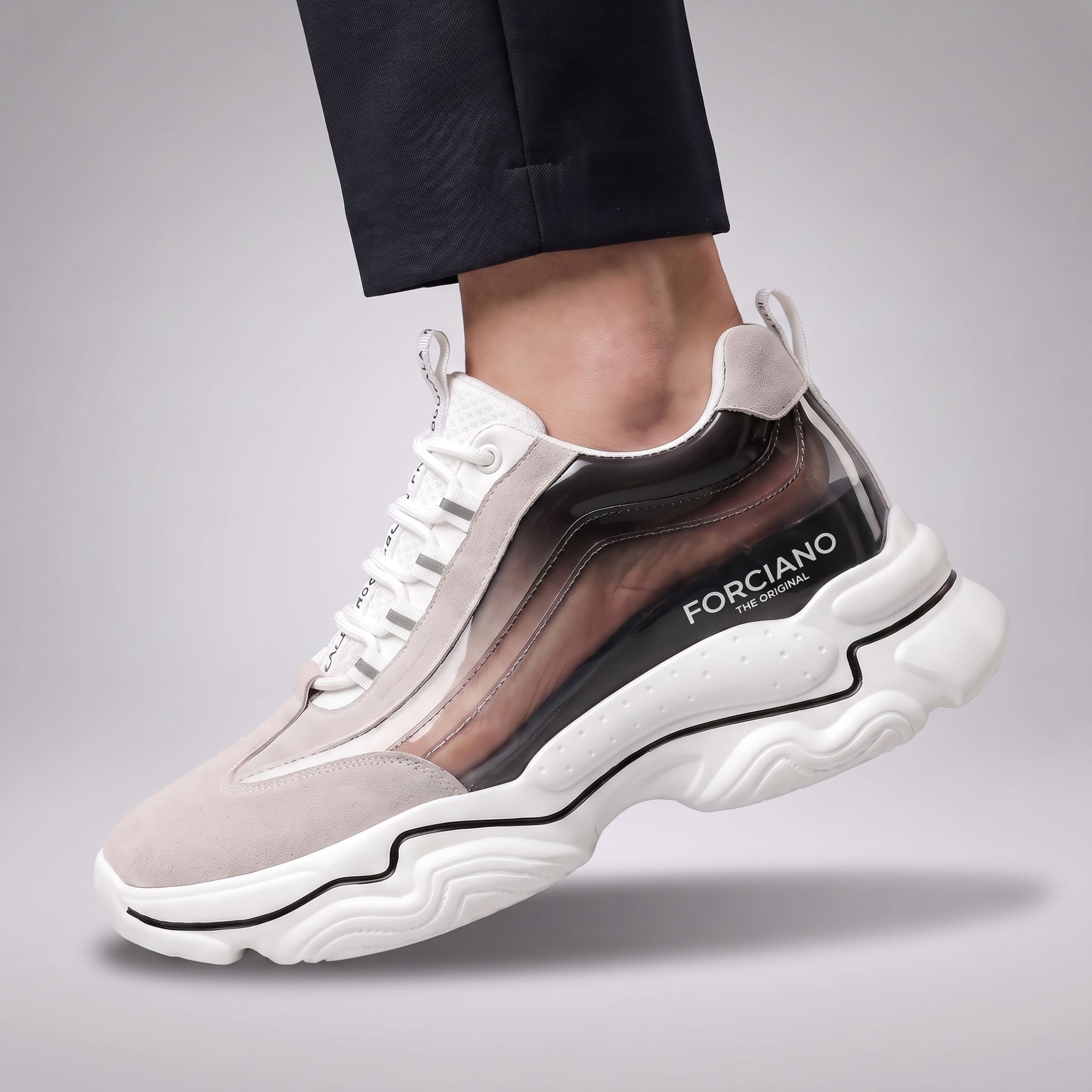 FORCIANO VALENCIA white Height Increasing Sneakers for Women shown on foot with a transparent cutaway section revealing the internal lift placement.
