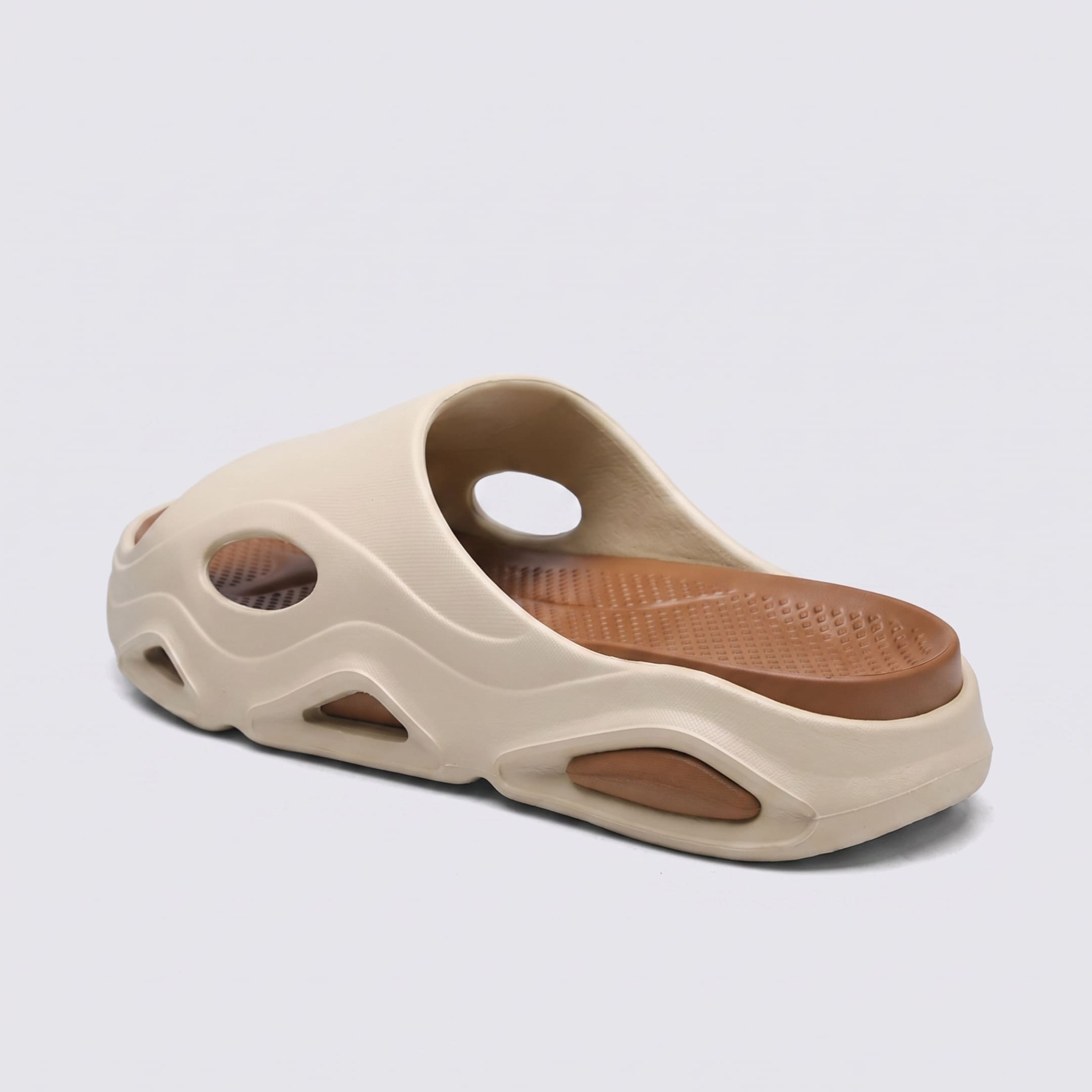 FORCIANO VECTOR cream-and-brown EVA height increasing shoes shown as a single sandal from a rear three-quarter angle with the footbed visible.