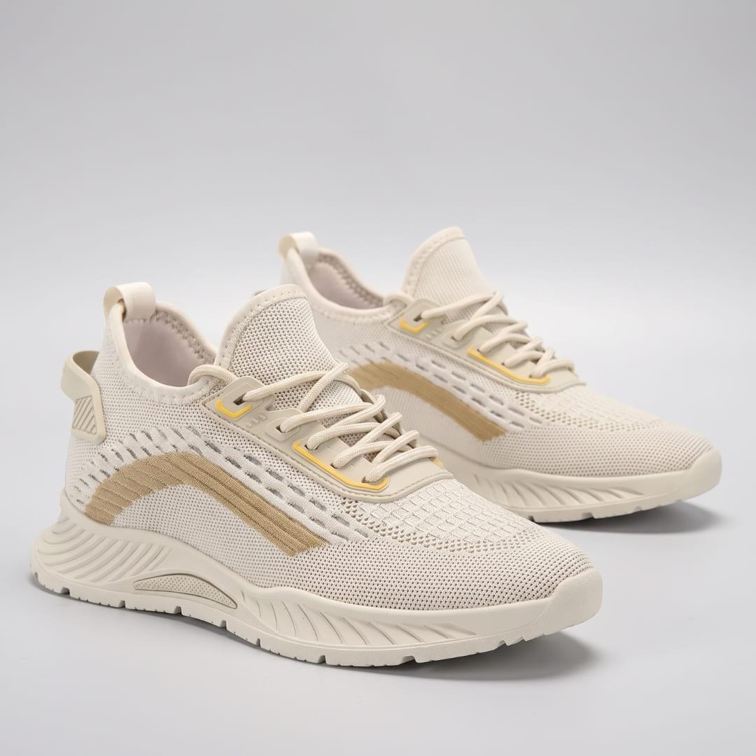 Pair of FORCIANO VISCONTI beige height increasing sneakers with air mesh uppers displayed from a front three-quarter studio angle.