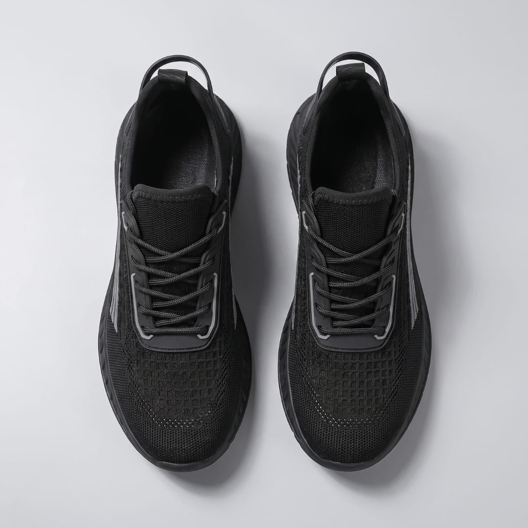 FORCIANO VISCONTI black height increasing sneakers shown as a pair from above with air mesh uppers, lace-up fronts and visible openings.