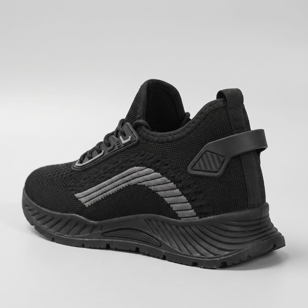 Rear three-quarter view of FORCIANO VISCONTI black height increasing sneakers showing the air mesh upper, heel support and sculpted sole.