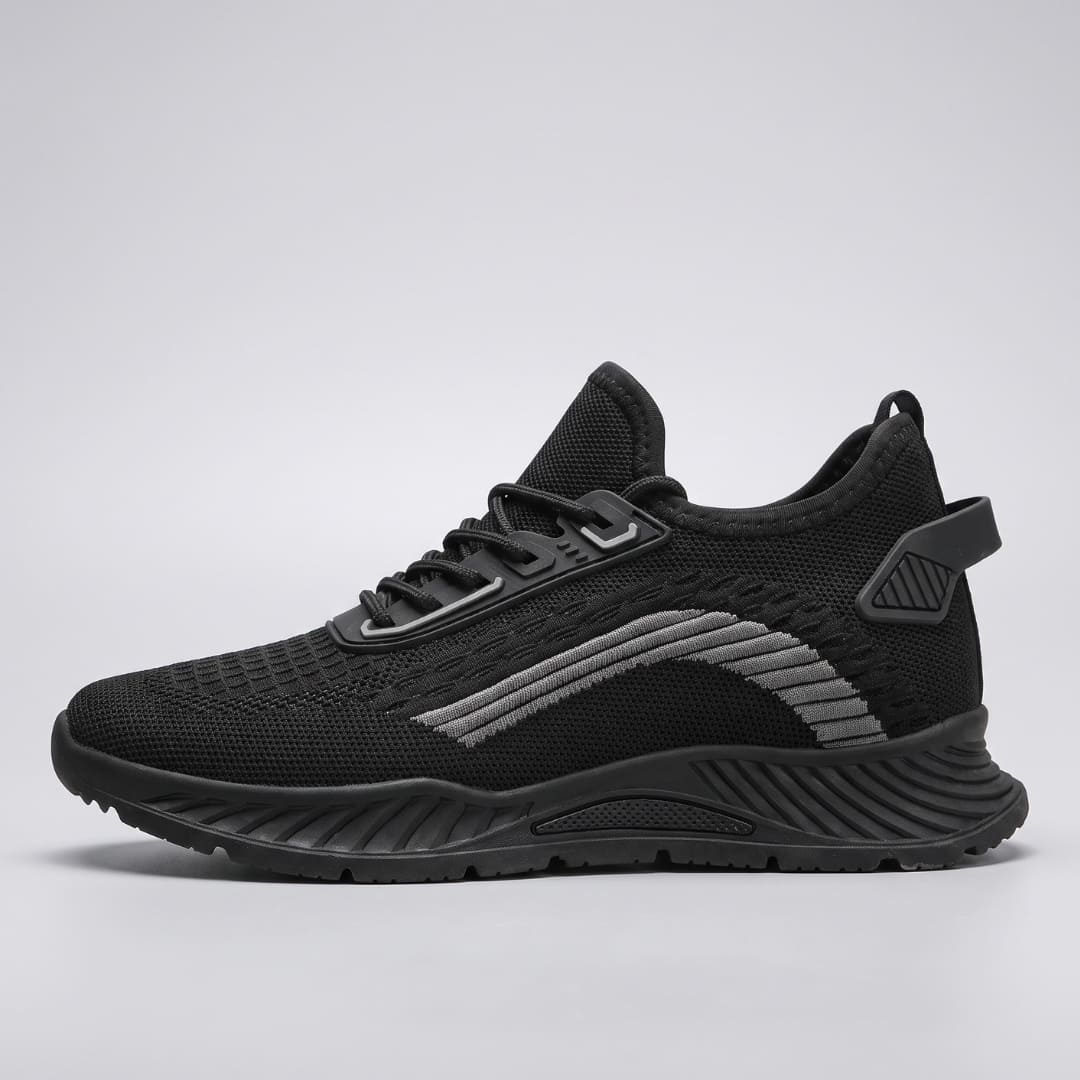 FORCIANO VISCONTI black height increasing sneakers in side profile showing the air mesh upper, lace-up design and contrasting side detail.
