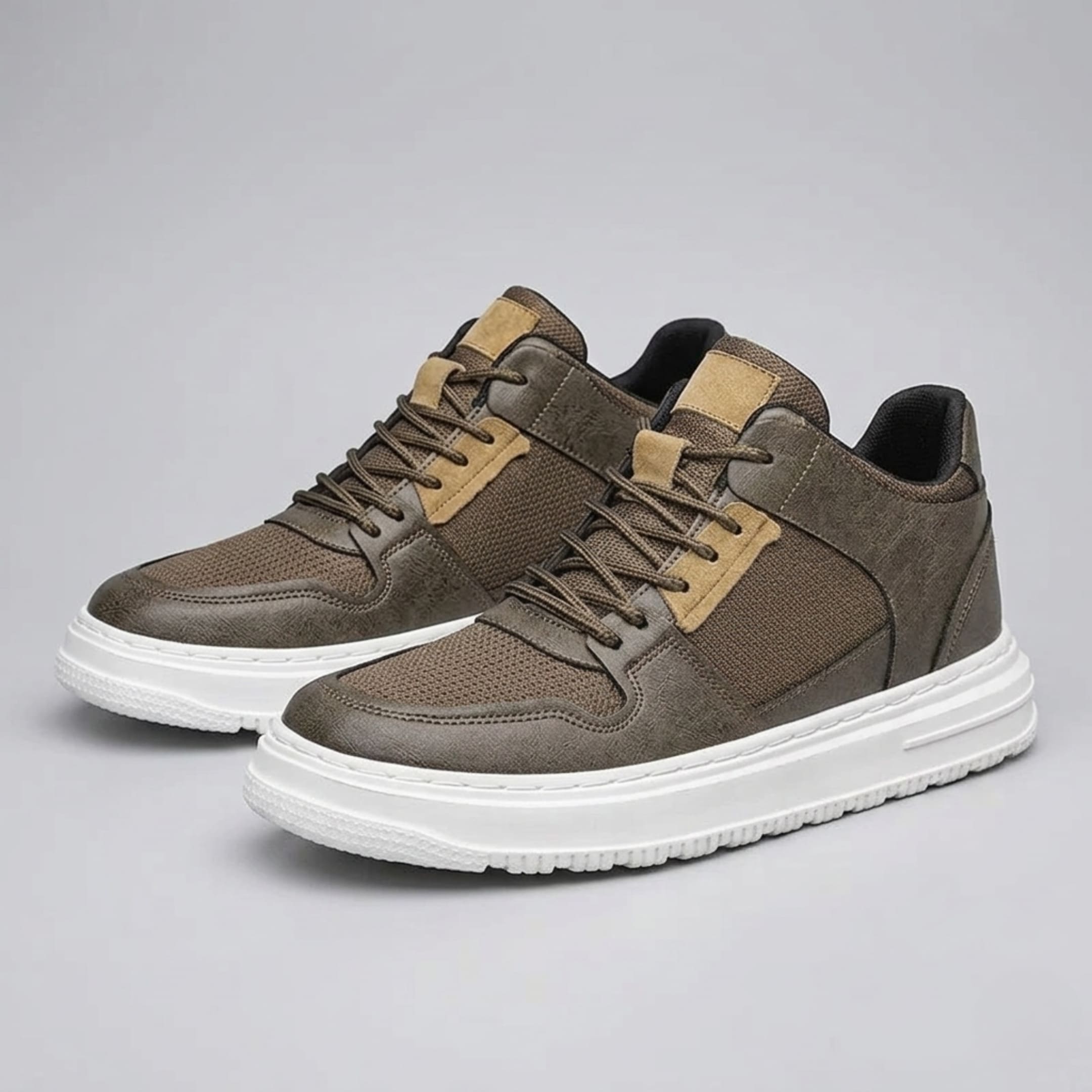 FORCIANO ZENITH brown sneakers that make you taller shown as a pair from a front three-quarter angle with breathable air mesh uppers.