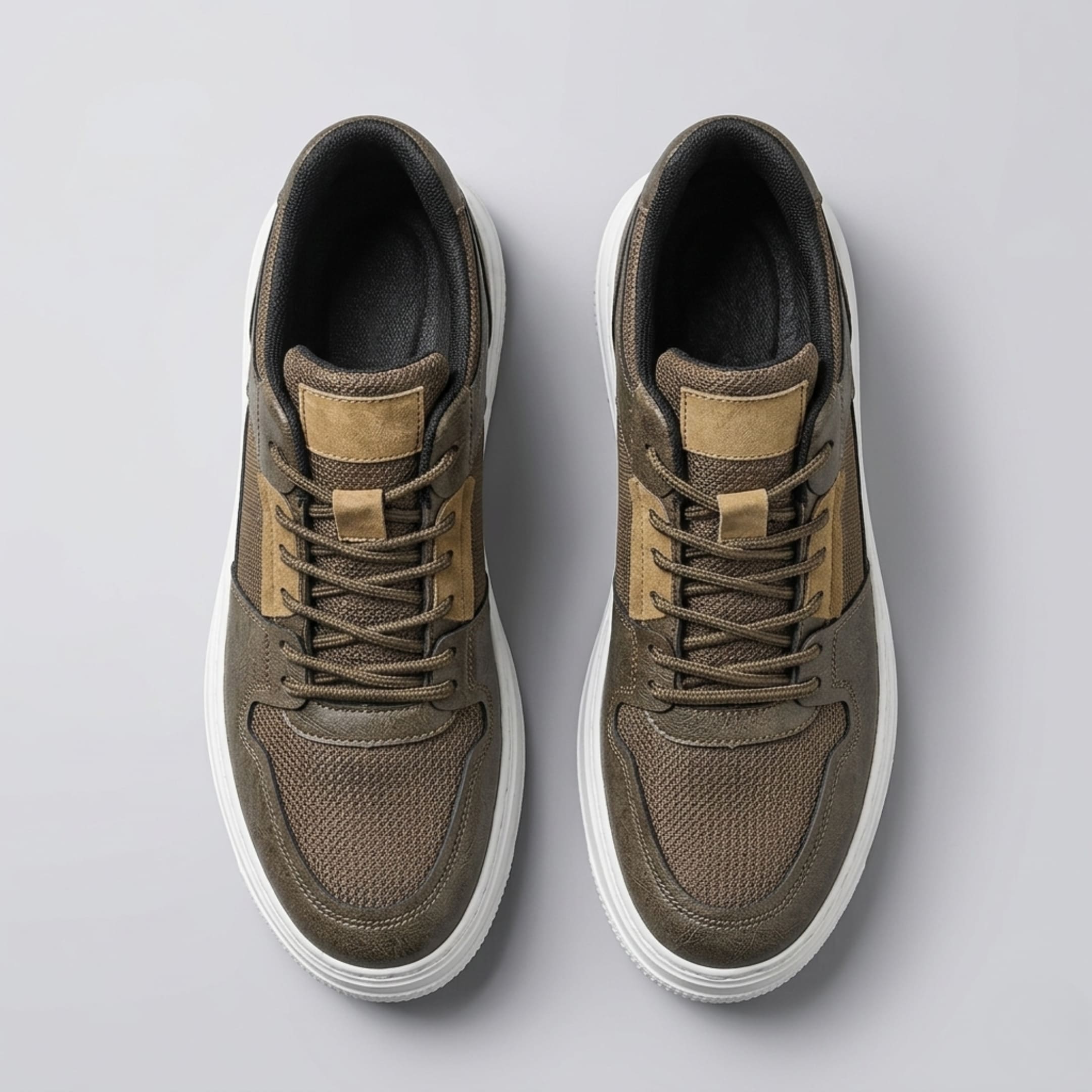 Top view of FORCIANO ZENITH brown sneakers showing the breathable air mesh uppers, brown laces, tan accents and padded openings.