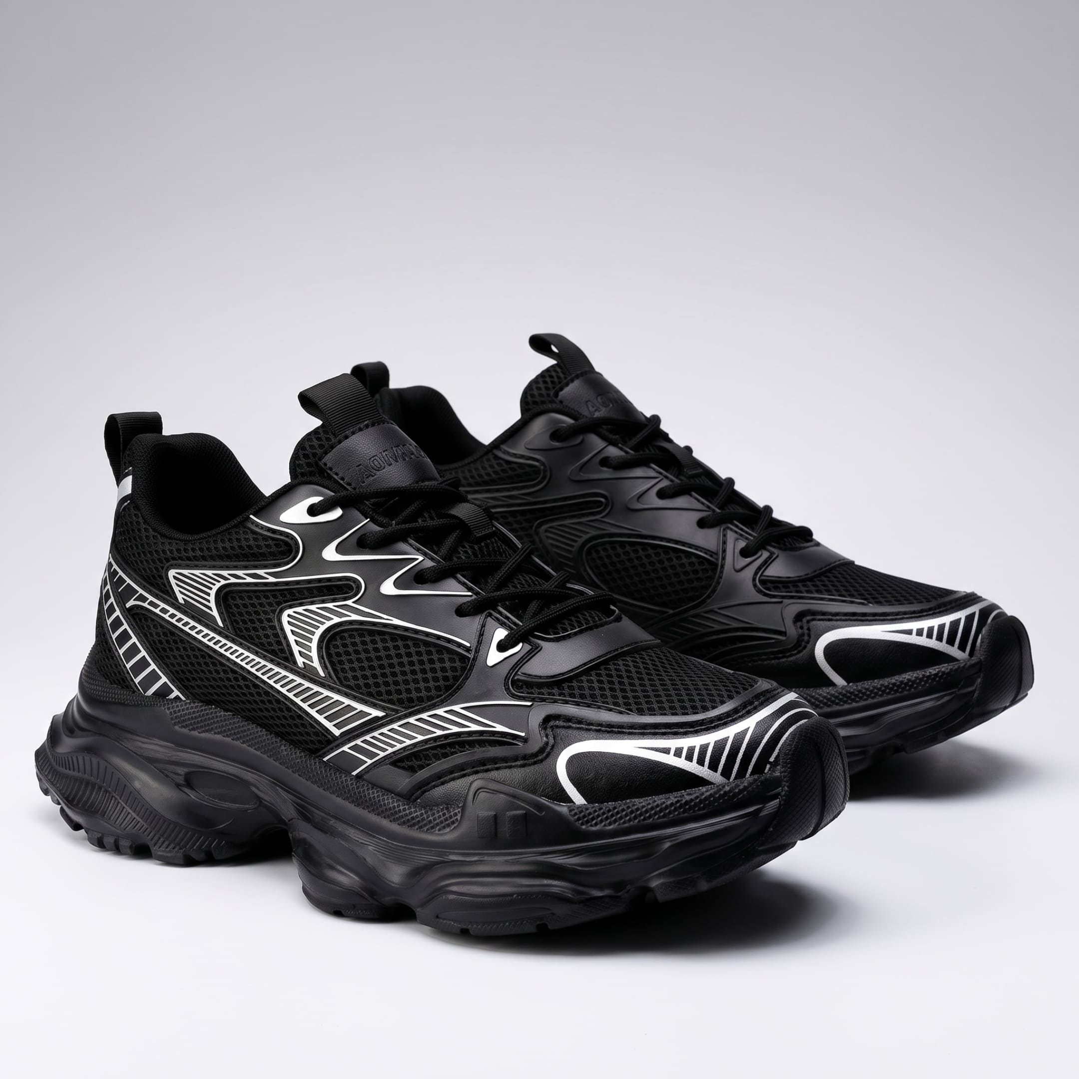 FORCIANO ZEPHYRA Black Height Increasing Sneakers for Women shown as a pair from a front three-quarter angle with breathable mesh uppers.