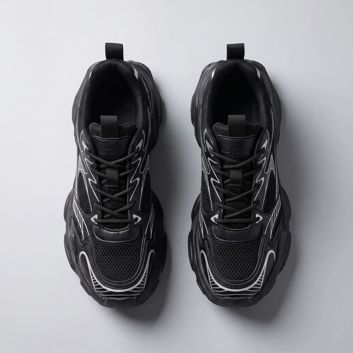 FORCIANO ZEPHYRA Black Height Increasing Sneakers for Women shown as a pair from above with laces, breathable mesh panels and white accents visible.