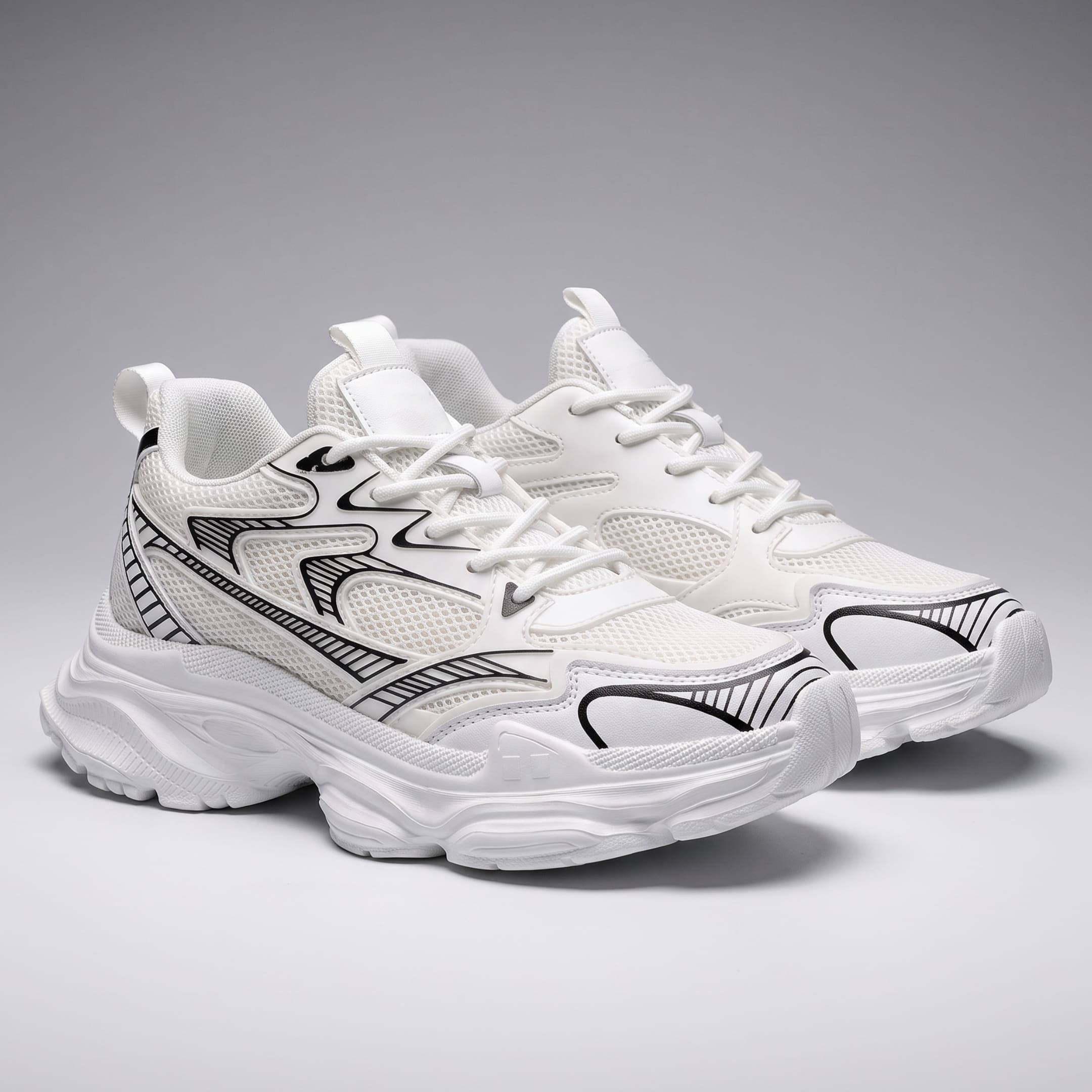 FORCIANO ZEPHYRA White Height Increasing Sneakers for Women shown as a pair from a front three-quarter angle with breathable mesh and black accents.
