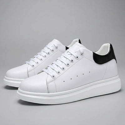 FORCIANO AURAS white elevator sneakers with leather upper, pair view on a grey background.